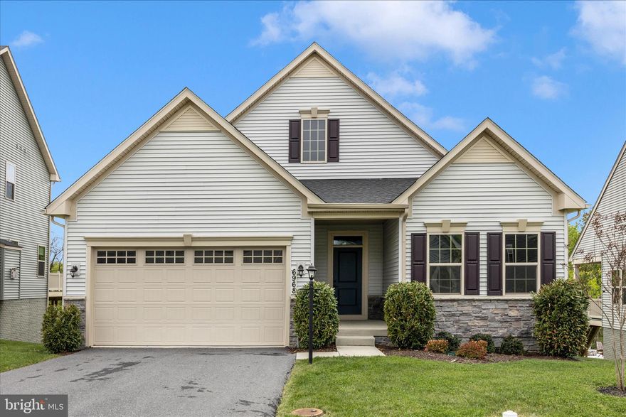 Rare opportunity for main level living in Lake Linganore! This practically new Ryan Homes Palladio Ranch offers the highly sought-after open floorplan with elevated finishes throughout.
The heart of the home is a gourmet kitchen designed to impress, featuring expansive countertop space, gas cooking, stainless steel appliances, two separate ovens, and a large pantry. The kitchen flows seamlessly into the dining area and spacious living room, where a stunning stone fireplace creates the perfect setting for both entertaining and everyday comfort.
Enjoy seasonal views of the lake and peaceful wooded surroundings right from your back porch and or backyard- offering privacy and natural beauty year-round.
The partially finished walkout basement adds incredible flexibility with a large carpeted recreation area, ideal for a game room, home gym, or additional living space. You’ll also find a fourth bedroom, third full bath, and a generous storage area with durable vinyl flooring.
Located in the highly desirable Lake Linganore community, residents enjoy resort-style amenities including private lakes, sandy beaches, multiple pools, scenic trails, playgrounds, pickleball and tennis courts, plus year-round community events.
Conveniently located near major commuter routes including I-70 and I-270, this home offers easy access to surrounding areas while still enjoying the tranquility of lake living. Just minutes from shopping, dining, and Downtown Frederick, this home truly delivers the perfect blend of main level living, modern convenience, and scenic lifestyle.