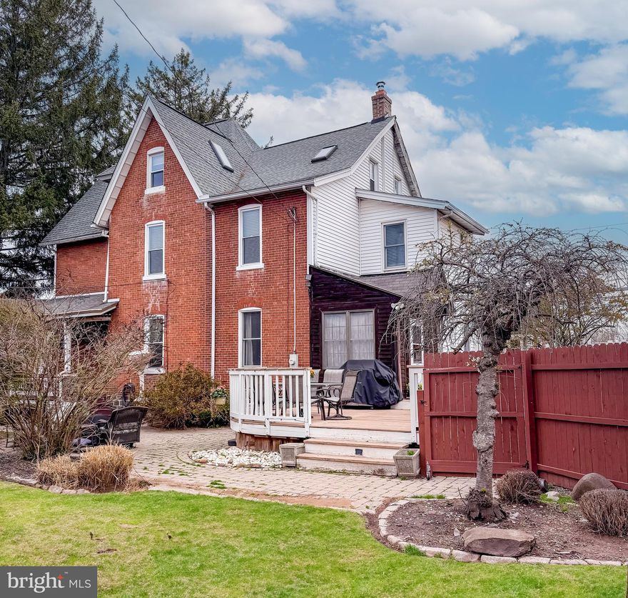 ***Showings start Saturday April 12th at 1:00pm!! Spacious & Charming Victorian Twin in the heart of Sellersville Boro! Welcome to this delightful brick home offering the perfect blend of historic charm and modern updates. As you step inside, you'll be greeted by beautiful hardwood floors, awesome moldings, 10ft + high ceilings, wooden beams, and skylights, creating an open and airy feel throughout. The updated Kitchen features granite countertops and sleek stainless steel appliances, making it an inviting space for the home chef. The large Dining Room is perfect for entertaining guests or enjoying everyday meals with friends and family. Relax and unwind in the spacious Living Room, which offers plenty of room to unwind or host holiday celebrations, with a door leading to the charming front porch—ideal for savoring your morning coffee and evening sunsets. Upstairs, the second floor features a large Primary Bedroom, a Full Bath and a second bedroom. From the 2nd Bedroom, a staircase leads up to the expansive third floor, offering 2 additional Bedrooms, a sitting room/office that can be used as another bedroom, vaulted ceilings, and amazing closet space—perfect for extra storage or creating a peaceful retreat. The large basement provides additional space for storage, while the fenced-in yard and expansive paver patios are ideal for outdoor activities, complete with an above-ground pool ready for summer fun! Enjoy the convenience of spacious private parking with  4 car parking, a newer shed for storage, and a prime location close to local shops, restaurants, the Sellersville Theater, and the well-known Washington House! Situated in the award-winning Pennridge School District, this home offers fantastic space, historic charm, and a truly welcoming atmosphere. Don't miss the opportunity to make this charming home yours. Welcome Home!!