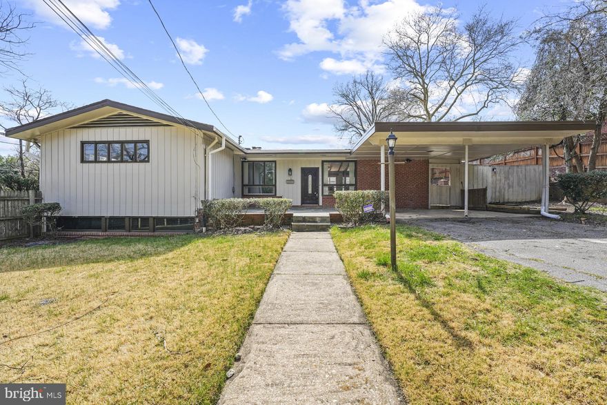 WELCOME to this versatile and sun-filled property ideally located just off Colesville Road, less than a mile from the vibrant heart of Downtown Silver Spring. 

Boasting 5 spacious bedrooms and 3 full bathrooms, the home features beautiful hardwood floors in the living room, two cozy fireplaces, and an abundance of natural light throughout. The large kitchen is equipped with stainless steel appliances, ample space for cooking and gathering, and a charming wall oven that adds both functionality and character.

Enjoy outdoor living with a fenced yard, covered carport, and a dedicated space for entertaining—complete with a brick grill perfect for summer BBQs.

Major updates provide peace of mind, including a new roof, HVAC system, and hot water heater. The hall bathroom has been newly renovated, while the rest of the home offers a fantastic opportunity to add your personal touch.

Conveniently located near I-495 and just steps from public transportation, this property combines accessibility, flexibility, and potential in one exceptional offering.