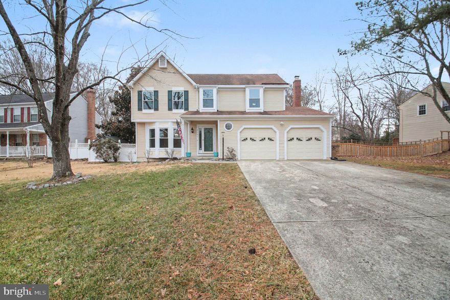 Move-In Ready 4BR, 2.5BA Colonial on a Level Lot Across from Rudolf Park in Amenity-Filled Aquia Harbour. Enjoy one of the best locations in the neighborhood! Directly across from Rudolf Park with tennis courts, basketball, volleyball, tot lot, and pavilion just steps away. This three-level home offers a functional layout and hardwood flooring throughout the entire main level, creating a warm and cohesive feel from the moment you walk in. Step into the foyer with sidelights and hardwood flooring that flows through the living room, dining room, kitchen, and family room. The living room features crown molding and a bay window, while the dining room includes chair rail, crown molding, and updated chandelier for a finished look. The kitchen is updated with quartz countertops, tile backsplash, stainless steel appliances, pantry, and hardwood flooring. The family room centers around a fireplace with built-ins on both sides and opens to the patio through double French doors. A main-level half bath with ceramic tile flooring completes the space. Upstairs, the primary suite features hardwood floors, crown molding, ceiling fan, walk-in closet, and private bath with dual vanity and step-in shower with tile to the ceiling. Bedroom two offers hardwood flooring and recessed lighting. Bedrooms three and four include carpet, crown molding, and ceiling fans, and share a full hall bath with ceramic tile floors and a tub/shower. The finished basement provides additional living space with a wet bar, built-in shelving, counter opening for a kegerator, laundry area, and flexible rec room setup. Exterior highlights include a Trex deck, patio, fully fenced yard with wood and vinyl fencing, aluminum siding, two-car garage, security system, and a level lot ideal for everyday use. The Abundant Aquia Harbour Amenities include 24 Hour Manned Front Gate + Residents Only Rear Gate; Two Pools; State Certified Police Force; Fire Dept; Marina w/Boat Ramp & Fishing Pier; Kayak/Canoe Launches; Golf Course w/Pro Shop, Putting Green, Driving Range & the World Famous Clubhouse @ Aquia Harbour Restaurant; Dog Park; Horse Stables, Riding Areas/Trails & Pens; Secure Storage Lot; Community Garden; PreSchool; Fishing Park; 8 Other Parks w/Tot Lots, Tennis & Basketball; Nature Park Like Surroundings with Tons of Wildlife including Deer, Fox & Bald Eagles, Blue Heron & More! Don't Forget About the Community Events including the Independence Day Celebration w/Parade and Fireworks, Oktoberfest, Outdoor Movies and More!***Any Offer Submissions Need to be Received by Sunday Night 3/15 for Review and Response on Monday 3/16***