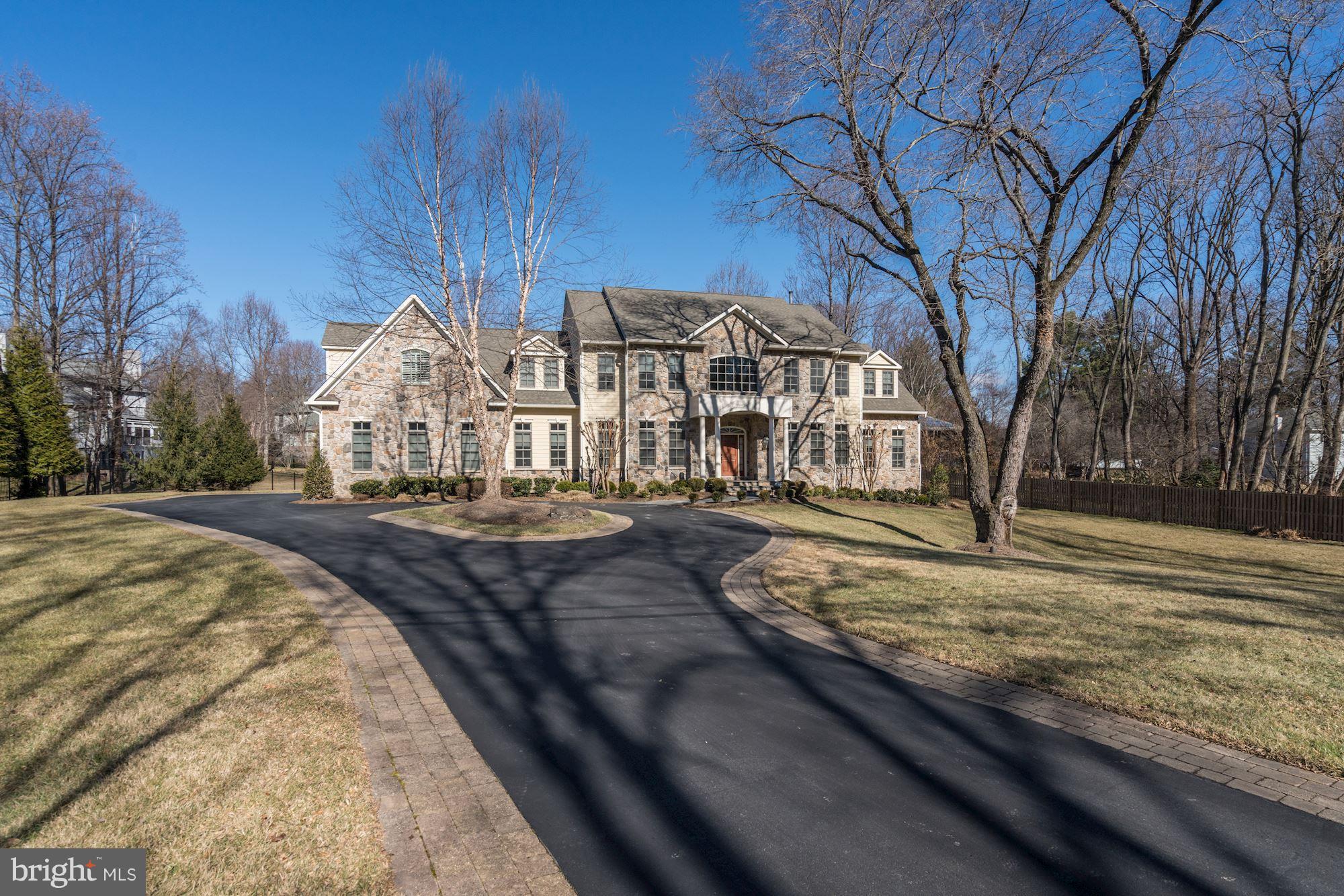 Magnificent newly updated residence w/ 7300+ SF on flat 1-acre & 3-car garage! Gourmet Kit & Bfast Rm open to FR w/coffered ceilings, gas FP & custom built-ins. ML Office & SunRm. Mstr Suite incl 2 WICs, sit. area & New MBA w/glass enclosed shower & free-standing tub. 4 addtl BRs up. 2 w/ new en suite BAs. Open LL w/rec rm &media area. 2mi to Potomac Village, quick drive to DC & Tysons!