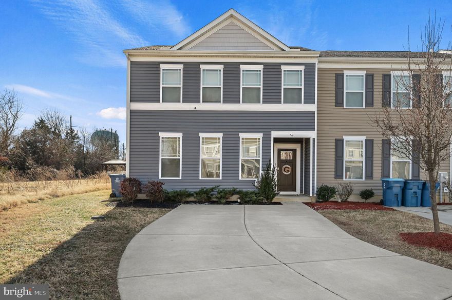 Welcome to 76 Citrus Drive, a beautifully maintained end-unit townhome ideally situated on a premium corner lot within a quiet cul-de-sac in Camden-Wyoming. With added privacy, additional side yard space, and an extended driveway, this home offers both functionality and curb appeal from the moment you arrive.

Step inside to an inviting open-concept main level enhanced by luxury vinyl plank flooring, recessed lighting, and an abundance of natural light pouring through oversized windows along the side and rear elevations, a unique advantage of end-unit living. The spacious living room flows seamlessly into the dining area and a thoughtfully designed kitchen that serves as the heart of the home.  Anchored by a large center island with seating, the kitchen features granite countertops, stainless steel appliances including a gas range and built-in microwave, modern cabinetry with sleek hardware, and ample prep and storage space. Subtle under-cabinet lighting adds warmth and ambiance, while the glass door provides effortless access to the backyard.

Outdoor living is just as impressive, with a custom paver patio designed for entertaining, grilling, or relaxing evenings at home. The fully vinyl-fenced yard offers privacy and security while maintaining a clean, low-maintenance aesthetic.

Upstairs, plush carpeting creates a soft transition throughout the second level. The spacious primary suite is filled with natural light and offers a private en-suite bath complete with a double vanity and an oversized walk-in shower. Two additional bedrooms are generously sized with ample closet space and share a well-appointed full hall bath. The convenient upper-level laundry area enhances everyday practicality and efficiency.

Tastefully decorated in a neutral designer palette with clean lines and open sight lines throughout, this move-in ready home blends modern finishes with comfortable living. From the natural light and open layout to the upgraded patio and premium end-unit location, 76 Citrus Drive captures the essence of low-maintenance living without compromising style or space.