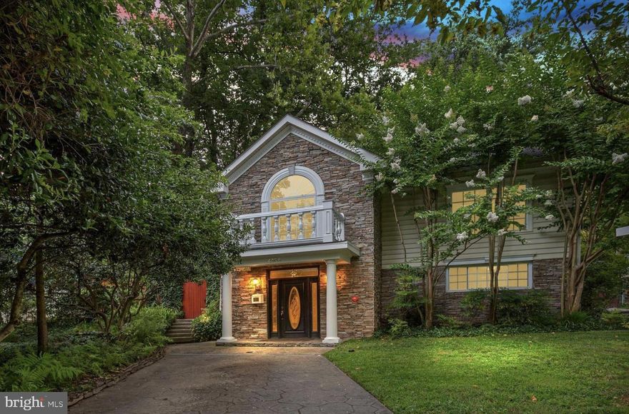 Welcome to 4105 Wexford Drive, a beautifully crafted custom home nestled on a tranquil private lot in the highly sought-after Rock Creek Palisades community. Surrounded by mature trees and lush landscaping, this stunning stone-front residence offers timeless character, exceptional space, and an unbeatable setting.

An inviting open foyer with elegant marble floors greets you upon entry, setting the tone for the home’s thoughtful design. The main level features two well-appointed bedrooms, a renovated full bath, and a convenient laundry & utility room with additional storage. 

Upstairs, beautifully articulated living spaces showcase rich exposed beams, custom built-ins, and a striking wood-burning stone fireplace in the expansive family and living room. This warm and welcoming area flows effortlessly into the gourmet kitchen and generously sized dining area—perfect for everyday living and entertaining alike.  The spacious primary suite is also located on this level and offers a generous walk-in closet and an updated en-suite bath for ultimate comfort and privacy.

A fourth bedroom and an updated full bath complete the top level, offering flexibility for guests or a private home office.

Step outside to discover a serene backyard oasis, where a stone patio provides the ideal backdrop for relaxing or hosting gatherings. A rare and exciting highlight of the property is the indoor sports court—perfect for basketball, squash, or transforming into a private home gym, studio space, or workshop. Parking is no problem as there are 2 parking pads for this home- a rare convenience in the neighborhood. Street parking is also readily available. 

Blending stylish, well-proportioned interiors with peaceful natural surroundings, 4105 Wexford Drive offers a seamless flow for modern living—all just moments from the amenities, parks, and conveniences of neighboring communities.