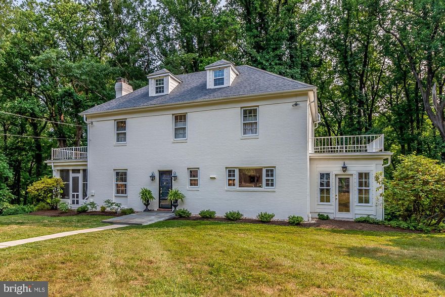 Rare and wonderful brick Colonial in idyllic cul-de-sac setting located on a prime, 1.7-acre lot in the coveted Wiltonwood neighborhood along the Greenspring Valley corridor. Character and updates abound, with entry foyer, two wood-burning Fireplaces, central air conditioning, large Living Room leading to inviting screened-in porch, open kitchen with island and stainless steel appliances, first-floor Family Room/Dining Room and four-season Sunroom/Den.  Upstairs boasts a Primary Suite with Full Bathroom (one of three custom Bathrooms) and private balcony, two additional bedrooms with a shared hall Full Bathroom and a second private balcony. Third-floor Art/Bonus Room could be converted to Bedroom or Office, and is plumbed for possible additional Bathroom. Other amenities include restored wood floors, newer roof (2020), newer HVAC system (2020) and an envy-inducing walk-out Lower Level with tall ceilings adorned with crown molding, a Family Room, separate storage room, exercise room/potential additional Bedroom space, full Bathroom with steam shower, and a Mud Room leading from the private outdoor entrance. Could be perfect for in-law/au pair suite (but would require septic upgrade to allow for additional bedroom). Expansive front yard with raised garden beds, plenty of space to play or relax, and a fenced inground pool with patio. Detached oversized garage has second-floor storage area and is sold As Is. Welcome home!