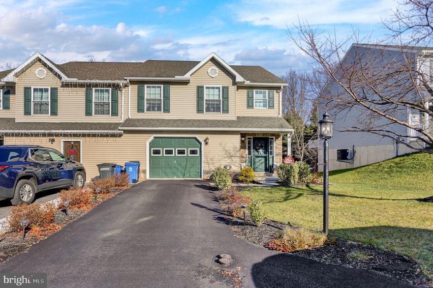 Upgrades galore in this beautiful home.  Custom kitchen cabinetry, lighting and pantry.  2 story foyer entry with open staircase.  Large 2nd floor laundry for convenience.  Double hung windows  with Low-E glass for energy efficiency.  Fully insulated garage that is dry-walled, painted and trimmed.  Beautifully finished lower level with multiple rooms.