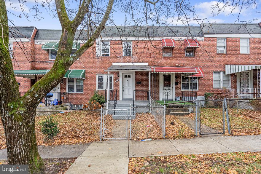 Take advantage of $0 down payment home loan options and make homeownership more accessible than ever! Seller is offering to pay a $2,000 credit to the buyer! Welcome to this inviting brick front rowhome, complete with a covered porch—perfect for enjoying your morning coffee or relaxing after a long day. As you step inside, you'll be greeted by gleaming hardwood floors that flow throughout the home, adding warmth and character to every room. Entertain with ease in the spacious living room, seamlessly connected to the dining room, creating the perfect setting to wine and dine guests. The kitchen offers ample cabinet and prep space, making meal preparation a breeze. Upstairs, you'll find a spacious primary bedroom with hardwood floors and plenty of natural light. The full bathroom features a custom tile surround tub/shower combo and original ceramic tile floors, adding a touch of classic charm. Two additional bedrooms provide comfortable spaces for guests or a home office. The fully finished lower level offers versatility as a recreation room or second living room and includes a full bathroom with a convenient stall shower. Step outside to your deck or fully fenced backyard, ideal for hosting summer BBQs and gatherings with friends and family. Located conveniently near Liberty Heights, Route 40, Route 1, and Mondawmin Mall, this home offers easy access to shopping, dining, and major commuting routes. Don’t miss the opportunity to make this charming and move-in-ready rowhome yours—schedule your showing today!