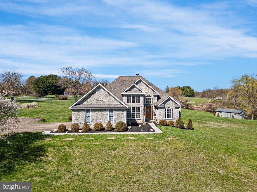 Rarely does a property come along that checks so many boxes at once, and 413 Church Hill Road in Landenberg does exactly that. Set on approximately 7 private acres in rolling Chester County countryside within the highly sought-after Avon Grove School District, this custom Keystone-built home delivers an exceptional combination of one-floor living, expansive acreage, stunning panoramic views, and the kind of freedom that comes with absolutely no HOA restrictions. Whether you are searching for more land, a private retreat with room to breathe, or a property with long-term potential, this is an opportunity worth serious attention. From the moment you arrive, the views set the tone. Every window in this home frames a different picture-perfect scene, from rolling fields, open sky, preserved farmland, to the kind of natural beauty that makes every morning feel like a getaway. The home sits elevated on the lot, offering sweeping sightlines in every direction. Whether you are inside relaxing by the fireplace or simply moving through the home, nature is always present just beyond the glass. Designed for ease and comfort, the layout is centered around one-floor living, a feature increasingly in demand and genuinely rare at this price point and acreage level. The main level includes a spacious primary suite with a full bathroom, two additional bedrooms, a hall full bath, hardwood flooring in the foyer and dining area, a bright and functional kitchen, first-floor laundry, and a welcoming living area anchored by a classic wood-burning fireplace. Everything needed for day-to-day living is accessible on a single floor, making this home ideal for those seeking to simplify without sacrificing space or quality of life. The full walkout basement with wood stove hookup adds tremendous flexibility, offering the potential to create additional living quarters, a home workshop, hobby space, or even a private in-law suite with its own separate entrance from the side of the property.
For those drawn to the Landenberg and West Grove areas specifically for the land, this property delivers. Approximately 7 acres of open, usable land with no homeowners association telling you what you can or cannot do. Bring your equipment, your vision, and your plans. The two-car attached garage, oversized detached storage shed, whole-house generator hookup, and wide driveway capable of accommodating large vehicles make this property immediately functional for those with an active, hands-on lifestyle. The land itself is open, gently rolling, and framed by mature landscaping, genuinely beautiful, highly usable, and full of possibility.  It is also worth noting that, depending on local township zoning and subdivision regulations, there may be potential for a buyer to explore subdividing a portion of the front acreage to create an additional buildable lot. This has not been verified or approved, and any interested party would need to conduct their own due diligence with Franklin Township directly, but for the right buyer, particularly a builder or investor, this adds a layer of long-term upside that is worth exploring. Properties with this kind of acreage and subdivision potential in the Avon Grove corridor are exceptionally rare.
The home has been maintained with care and features several meaningful recent upgrades. A brand-new HVAC system was installed in December 2023, and the septic system was serviced in the fall of 2022.
Located just minutes from the charming restaurants and shops of Kennett Square, with easy access to Route 1, Route 41, and the Delaware border, this property sits at the sweet spot between true rural privacy and everyday convenience. Residents of the Avon Grove School District consistently rank among the most sought-after in Chester County, drawing buyers from across the region — including families relocating from Delaware, New Jersey, and the Philadelphia Main Line — who want top-rated public schools without sacrificing land, space, or lifestyle.