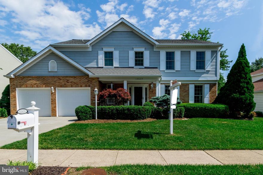 Meticulously maintained!  Updates galore:  HVAC '16, Anderson Windows/Patio Door '13, Front Door '13, Garage Doors '13, Concrete Driveway '10, Roof '07, Tankless HWH '11!  Kitchen w/granite tops, Travertine backsplash (''14), newer SS appliances (Bosch dishwasher '17)!  Hardwoods - main/UL! Nest thermostat/smoke detectors! Undergrd sprinklers!  Huge deck!  Unfinished basement awaits your design!