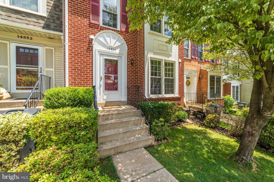 Welcome Home! This spacious three-bedroom with two full bathrooms and two half bathrooms is the perfect townhome. The spacious design paired with a bright and airy interior with plenty of natural light make this home a must see. Start your morning sipping coffee on the upper level deck overlooking the fenced in yard. Inside through the front door, you are greeted with a modern kitchen with an eat-in breakfast nook, stainless steel appliances, and ample counter space. The main level features an open concept dining/living room and a half bathroom. The majority of the home features gleaming hardwood floors except in the bedrooms which have plush carpet and the kitchen/baths which have ceramic tile. The three bedrooms upstairs have great closet space and can easily accommodate large furniture. The guest bathroom is located off of the hall. The primary bathroom is attached to the primary bedroom and has a large stand-up shower. The finished basement makes the perfect game room complete with powder room and large storage room which houses the laundry.. The flooring in the basement is BRAND NEW. The basement also has an egress door out to the back yard patio with bench swing. The home comes with a brand-new shed perfect for storing garden tools or extra storage. This home has 2 assigned parking spaces and plenty of visitor parking. Conveniently located near I-95, bus, and VRE. It won t be on the market long! Schedule your showing today.