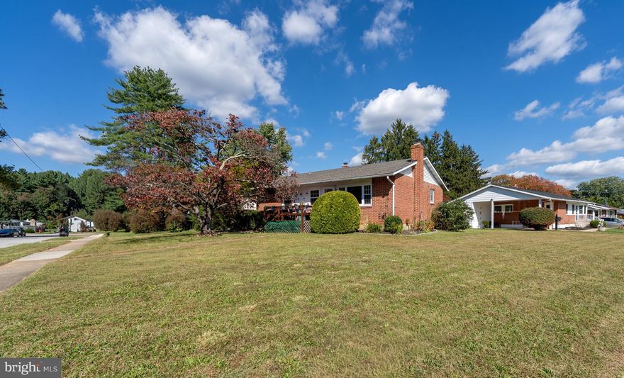 This beautifully updated corner home combines timeless features with modern comforts. The spacious kitchen features tile flooring, sleek granite countertops, and a vintage gas Caloric stove that works well, perfect for any home chef. (If the buyer prefers a different stove, a credit will be given.) The main floor boasts refinished hardwood floors, newly installed windows (2023 and 2025), and a bright, welcoming living room that opens onto a cozy deck—ideal for outdoor relaxation. The home sits on a large corner lot with a big front yard and a nicely landscaped backyard, enclosed by a beautiful bamboo fence and featuring a shed for extra storage. A fully finished basement offers a versatile den area anchored by a beautiful electric chimney, plus an extra room with a walk-in closet—perfect for an office or storage. To ensure the lower level stays perfectly cozy and comfortable during the winter months, the basement is also equipped with a dedicated wall heater. The basement also includes a convenient half-bathroom and a spacious laundry room with a washer and dryer. The main floor features a bathroom with a relaxing jacuzzi bathtub. Additional updates include a new roof (2019), new heating and air conditioning units (2020), and a new hot water heater (2020), providing peace of mind and energy efficiency. This home offers comfort, character, and plenty of room to grow. Ideally positioned for easy daily living, this home is nestled in a quiet, family-oriented pocket where schools and local shops are just a short walk away. The neighborhood is known for its sidewalk-lined streets and friendly atmosphere, making it easy to ditch the car for school drop-offs or quick weekend errands.
IMPORTANT!
Please make sure you wear show covers.  Also, please close the closet door in the basement.  It has an system that turns on the light on when you open it and  turns off the light when you close it. Do not turn on the jacuzzi without water; it will damage the motor.
