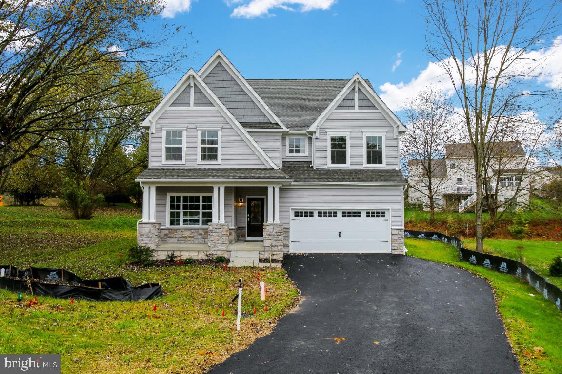 **THIS HOME IS BUILT AND MOVE IN READY!!***BEAUTIFUL OPEN CONCEPT CUSTOM "COVINGTON" FLOORPLAN & CRAFTSMAN STYLE EXTERIOR WITH FRONT PORCH, PILLARS + STONE ACCENTS ** ENTER INTO INVITING FOYER WITH ENGINEERED HARDWOODS THROUGHOUT FIRST FLOOR**GOURMET KITCHEN WITH QUARTZ COUNTERS ** UPGRADED STAINLESS STEEL APPLIANCES INCLUDING GAS COOKTOP & ENTERTAINING ISLAND WITH SEATING** HUGE WALK-IN PANTRY* **KITCHEN OPENS TO FAMILY ROOM AND EATING AREA WITH LARGE BRIGHT WINDOWS AND GAS FIREPLACE** 9 FT CEILINGS ON 1ST FLOOR AND LOWER LEVEL***1ST FLOOR LIBRARY + SEPARATE DINING ROOM**GARAGE ENTRY INTO SPACIOUS MUDROOM WITH PLENTY OF STORAGE SPACE AND WALK-IN COAT CLOSET** HARDWOOD STAIRS LEAD TO LOFT/LANDING AREA AND LEAD TO MASTER SUITE W/ OVERSIZED HIS AND HERS WALK-IN CLOSETS + LUXURY "SERENITY" BATH FEATURING FREESTANDING TUB, DUAL VANITIES, + LUXURY SHOWER**SECONDARY BEDROOMS ARE LARGE AND ALL HAVE WALK-IN CLOSETS****3 FULL BATHS (BUDDY BATH AND 1 GUEST SUITE)ON UPPER LEVEL +2ND FLOOR LAUNDRY TOO...ALL THIS ON LOVELY 1/2 ACRE PUBLIC WATER, SEWER, AND GAS LOT** NO HOA** AWARD WINNING SCHOOLS **ROUTES 70, 99,29, MINUTES AWAY ***( Home on front lot (2628) is Sold and occupied - please be considerate if driving by) **2624 is Lot 7 on rendering in pics**