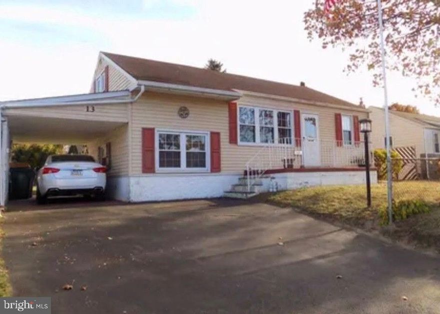 This 3 bedroom, 2 full bath split level home is conveniently located in the Green Lynne neighborhood, close to major roadways, shopping and dining. Enter into the spacious Living Room, with hardwood flooring under the carpet, and offers flexible use such as a separate Living Room and  Dining Room . Straight ahead you will find the Kitchen with electric cooking, built-in microwave, dishwasher, refrigerator & plenty of cabinet & counter space. Down the hall find a convenient main level Bedroom with 2 closets and hardwood flooring & a full bath  with walk-in jetted tub with seat. Upstairs you will find another bedroom with hardwood flooring & plenty of storage space. The lower level offers another bedroom with new laminate plank flooring. Down another level you will be treated to a full basement, not often found in Levittown, with large recreation room with bar, a full bathroom with stall shower & new laminate plank flooring, a storage/utility/workshop & laundry area with included washer & dryer. The fenced backyard is level & offers a nice-sized shed with electric. This home has central air conditioning & the solar panels on the rear of the house will significantly lower your monthly electric bills. In addition, the seller is providing a basic one year home warranty to the buyer at closing! Come see this home today, you won't be disappointed!