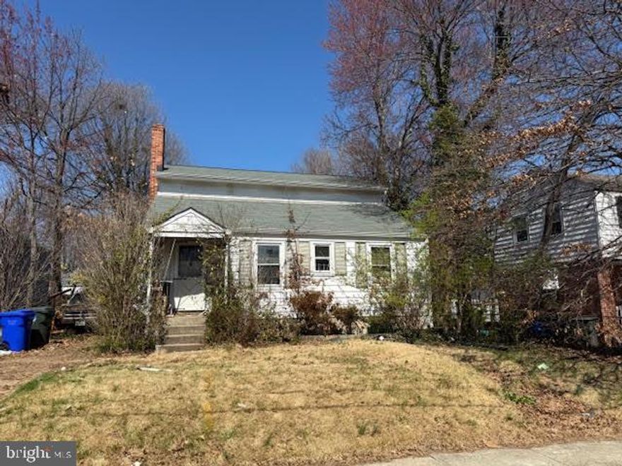 Attention Investors!  5110 Mangum Rd in College Park—is a well-located investment opportunity with a flexible and functional layout. This four-bedroom, three full bath home offers strong  potential and versatility.  The main level features living area, formal dining, a bedroom and full bath, providing added convenience for a variety of living arrangements. Spacious living and dining areas, along with a practical kitchen, create a solid foundation for value-add improvements.  Upstairs includes three well-proportioned bedrooms and two full baths.  The large fenced in yard and covered porch are  added bonuses to this space. This property is being sold strictly AS-IS and needs a full rehabilitation.  Strong upside potential with after-repair value and demand driven by proximity to University of Maryland, major commuter routes, and public transportation.