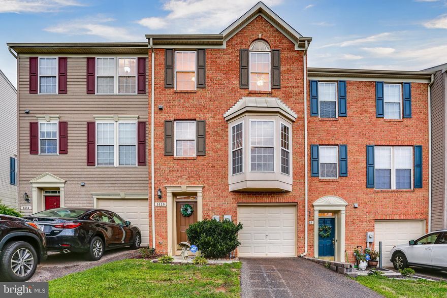 Great opportunity to own this nicely updated three bedroom, two full and one-half bathroom brick townhome with an attached garage in the Villages of Dorchester.  Updated, light-filled, large kitchen with island, features modern white cabinetry, hardware, stainless steel appliances, and adjacent dining area.  Open floor plan with composite deck off the kitchen (installed 2020). Bright and airy living room offers hardwood floors and entrance to the powder room.   Huge upper level master suite includes a walk-in closet, en-suite full garden bath with a soaking tub and separate shower, dual-sink vanity, and a dressing area.  The upper-level also includes two additional bedrooms and a second full bath  Fully finished entry level has a large family room and walk out exit to the private fenced in backyard.  Community pool.  Close to routes 295 and 100, Thurgood Marshall Airport, Amtrak, and just minutes from Ft. Meade and NSA.