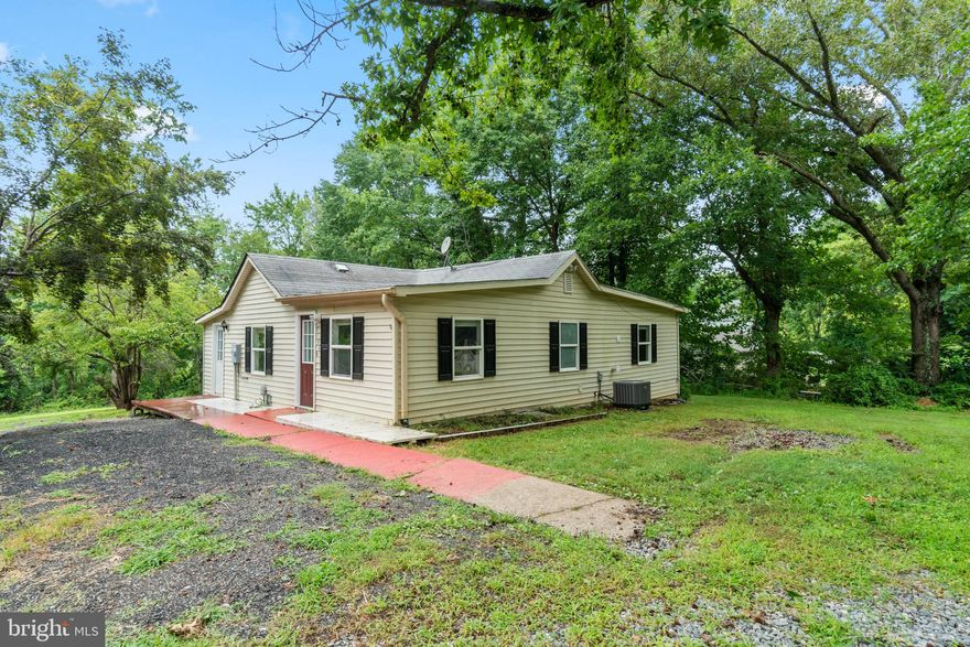 Enjoy country living with all the city conveniences nearby in this adorable Bungalow ready for your personal touch.  Granite Counter tops with stainless steel appliances. The home sits on 1.5 Acres and includes 2 sheds.  A short distance to Quantico, ample shopping, dining and I-95.