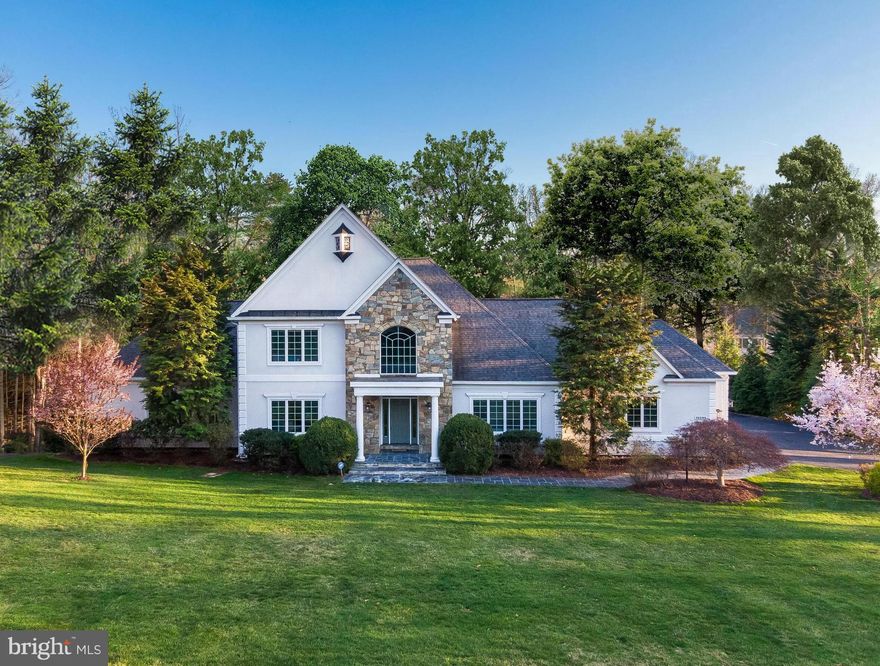 Beautiful colonial masterpiece designed by the renowned G. Sagatov, nestled in the prestigious enclave of Hannah Hills. This residence boasts timeless elegance and includes a rarely available large main-level primary bedroom suite, a detached garage addition (2019), and a floor plan that provides ample space for comfortable living and large-scale entertaining. With over $200,000 in recent upgrades, including a new roof (2016) and a new hot water heater (2023), the home combines modern updates with timeless appeal. A neutral paint palette enhances the fresh and inviting atmosphere throughout. Featuring five expansive bedrooms and four and a half bathrooms, this home is designed for both comfort and luxury.

As you step inside, you are greeted by the grandeur of marble floors, seamlessly transitioning into rich hardwood in the living room and dining room, while plush carpet adds a touch of warmth to the bedrooms. The family room is the heart of the home with a gas fireplace and a view of the beautifully landscaped yard, providing an inviting space for relaxation and gatherings. Adjacent to the family room is a spacious main level office with a closet, perfect for remote work or study. The family room opens to the vaulted breakfast room and gourmet kitchen. The kitchen is a chef's delight, featuring a new gas range cooktop with downdraft (2024), a Subzero refrigerator, double wall ovens, an island, and multiple pantries. Its design and functionality make it a perfect space for culinary adventures. The kitchen flows seamlessly into the mudroom and separate laundry room, providing convenience and ample storage space to keep the home organized and tidy.

The main-level primary bedroom suite stands out as a true sanctuary. This suite offers unparalleled privacy and accessibility, providing a serene retreat within the home. With its spacious layout, including double walk-in closets, the primary suite accommodates both relaxation and functionality. Beneath the suite's cozy carpeting lies beautiful hardwood flooring, adding a touch of classic elegance to the modern design. The ensuite bathroom is beautifully appointed with an updated vanity area and offers a spa-like experience with a large jetted tub.

The upper level features an ensuite bedroom and bathroom, and an additional bathroom that connects two more bedrooms. The light-filled lower level has a fantastic rec room that walks out to the patio and hot tub (2022). The lower level also features a full bathroom and a spacious bedroom with a walk-in closet. The expansive unfinished storage area in the lower level invites future customization possibilities.

For car enthusiasts or those in need of flexible space, the property includes a side-load three-car garage plus an additional detached two-car garage, accommodating a total of five vehicles. The detached two-car garage offers ample space for a boat or can be transformed into an exercise area, art studio, workshop, or office - catering to diverse lifestyle needs.

This retreat offers a landscaped private .88-acre yard with a lawn irrigation system, providing an ideal setting for outdoor enjoyment. Entertainment and leisure are at your fingertips with a deck, a hot tub on the patio, and a transferable membership to the Oakton Swim & Racquet Club that ensures you'll skip the long wait for swimming this summer.

With its finishes and thoughtful design, 10595 Hannah Farm Road represents a unique opportunity to enjoy a sophisticated lifestyle in a desirable location. The neighborhood is ideally positioned near Difficult Run and the Cross County Trail, offering a peaceful atmosphere and premium living convenience. Only minutes to Flint Hill & St. Marks private schools, I-66, the Vienna Metro Station, downtown Vienna, Reston, Tysons, and the Dulles Expressway. Located in the Madison High School Pyramid. Don't miss the chance to make this stunning property your new home!