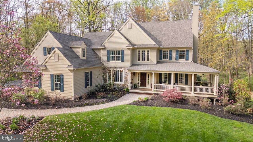 This property offers an exceptionally private and tranquil setting of over four acres in the heart of Chadds Ford township; and yes, located in Unionville Chadds Ford School District!  With over 4,800 square feet, this home is thoughtfully designed to take full advantage of the setting and is meticulously maintained inside and outside. The wrap around front porch welcomes you and offers an inviting spot to enjoy the spectacular views and sounds of nature; and the spacious screened porch overlooking the pool and back of the property ensures enjoyment of our three seasons; a flagstone patio just off the screened porch and kitchen dining area, with an additional outdoor spot of a cozy balcony right off the primary bedroom with an equally beautiful view of pool and back yard. Approximately 2 acres of the property has been fenced for deer. This home is an ideal blend of tradition with a 2 story foyer center hall, turned staircase, a formal living room with gas fireplace and a formal dining room along with a well-appointed kitchen that opens to a large family room with a handsome stone floor to ceiling wood burning fireplace; additionally there are two den/offices on the main floor, and powder room. Those that appreciate attention to detail will notice the beautiful millwork, hardwood floors and interior transom windows above many of the rooms on the main level giving that extra warm light. The second floor has 5 bedrooms and three full baths plus a convenient bright sunny laundry room complete with laundry tub. The primary bedroom features vaulted ceiling and gas fireplace and a spacious bathroom with large shower, tub, double vanity and bidet. The lower level is an ideal set up for guests or an au pair with its own sleeping area, family room, full bathroom and kitchen efficiency and sliding door opening to back yard. There is also a finished hobby/bonus room on this level. The important updates including roof 2022, 2 HVAC 2024, new pool heater, interior and exterior repainted in 2022, new driveway base (except apron by garage) 2020, kitchen remodel 2022, and proposed stucco remediation will give the new owner peace of mind. This property is a pleasure to show!