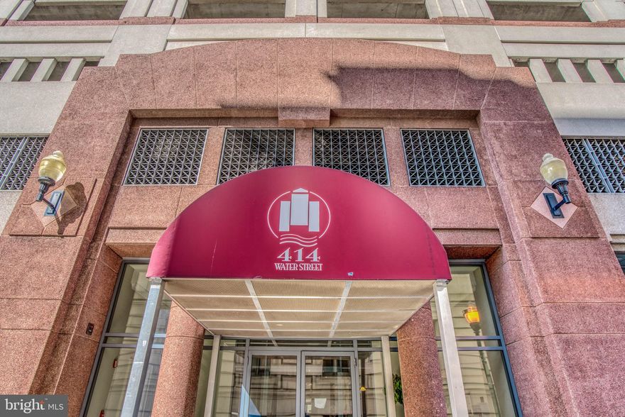 Welcome to the biggest bang for your buck in downtown Baltimore. This terrific unit has a birds eye view of just about everything.  Take in the gorgeous  city scape that includes the iconic views of City Hall and The Shot Tower just for starters. This building is amenity rich with 24 hour front desk service, terrific outdoor pool, cutting edge fitness center, meeting room, assigned garage parking space and so much more. The unit itself is pristine and turn key. Freshly painted a contemporary gray, you'll love the amazing natural light and clean lines. The new luxury vinyl flooring  is on trend and maintenance free,  The living room is spacious with a terrific balcony. The bedroom has more gorgeous views, great closet space and the full bathroom is among one of the largest in this size condo. Don't miss the in unit laundry that is tucked away off the kitchen. The kitchen has tons of functional  counter space space, updated appliances, warm wood cabinets  and a built in bar where guests sit and enjoy conversation while you prepare many a gourmet meal. Don't feel like cooking? No worries, there are loads of restaurants in any direction of this perfectly located unit. Don't miss the opportunity to snap up this below market today!