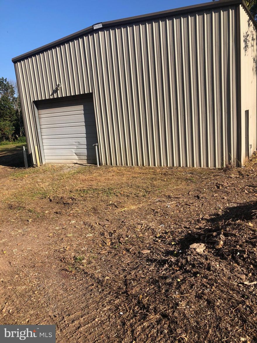 40' x 80' Steel built Garage with 3 over head doors, 2 man doors, 14' to 19' Ceiling, Insulated with concrete floor. Great building for storage, hobbyist, Car Collector,  or  Motorcycle/4 wheeler Enthusiast , Great for a Wood Shop hobby, Tinker,  or project area with plenty of room to work. There is a nice yard area around the building to maneuver your equipment  around and into the Garage.  A Self Employed Craftsman, who needs storage. So much to see and Enjoy.There is a nice yard area around the building to maneuver your equipment into the garage. , Also there is a great house that goes with it with plenty of room for your family and your  in-Laws, Newer kitchen, update baths, Beautiful hardwood Floors, Great storage, 3 full baths, large Family Room. 2nd  Eat in Kitchen. Nice setting,  2 Lots front and back .The house and Garage all set back from the street.