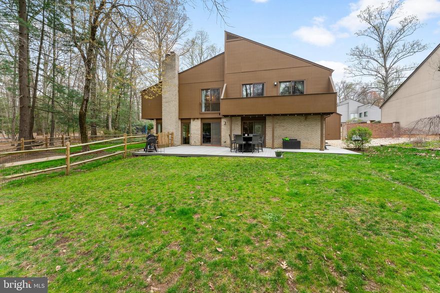 This Amazing Home Is Located In The Heart Of Reston! The Gourmet Kitchen Has Granite Countertops, Stainless Steel Appliances Including A Sub Zero Fridge & Gas Cooktop, Custom Cabinets w/Soft Close Drawers, Glass Tile Backsplash & Sliding Glass Doors Leading Out To One Of The Patios. Directly Off Of The Kitchen Is The Eat In Area With Built In Wine Cabinets. The Family Room Offers A Beautiful Brick Gas Fireplace, Recessed Lights, A Sitting Area, Floor To Ceiling Windows & Sliding Glass Doors To The Backyard. There Is Another Dining/Bar Area w/Sliding Glass Doors & More Gorgeous Floor To Ceiling Windows Offering The Perfect Amount Of Natural Light. The Powder Room & The Coat Closet Finish Out The Main Level. The Spacious Primary Bedroom Has A Private Balcony Overlooking The Backyard, Built Ins w/A Vanity, Updated Larger Closet With A New Closet System & The Updated Primary Bathroom. There Is A Bedroom Connected To The Primary Bedroom That Can Be A Sitting Area For The Primary, Or A Nursery/Separate Bedroom. Bedrooms 3 & 4 Both Have Great Space & Share A Balcony. Bedroom 5 Has A Beautiful Walnut Ceiling, Two Cozy Reading Nooks With Beds & It Could Also Be Used An Office. There Is An Updated Full Bathroom In The Hallway, A Linen Closet & The Laundry Room. The Outdoor Space Is Stunning w/Extensive Hardscaping, Multiple Patios, Sliding Glass Doors, Balconies & A Fenced Space For Pets & Kids. The 2 Car Garage Offers Plenty Of Space To Park An F-150 & Another Midsize Car, There Are 2 Additional Parking Spaces Directly In Front Of The Garage As Well As Open Parking Spaces For Guests. UPDATES INCLUDE: Newer Roof, Newer Hardy Plank Exterior, Newer Windows & Glass Doors, Newer Hot Water Heater, Fence 2021, Primary Shower 2021, Custom Paint 2021-2025, Attic Insulation Updated 2022, Custom Closet System In Primary 2024 & Bedroom 4 2022, New Flooring In Bedroom 5 2023 & 2 French Drains & Professional Landscaping 2024. Reston Association Amenities: Pools, Tennis Courts, Lake Access, Walking/Biking Trails, Playgrounds & Pavilions. Conveniently Located Minutes From Reston Town Center, Dulles Airport & The Metro!!!
