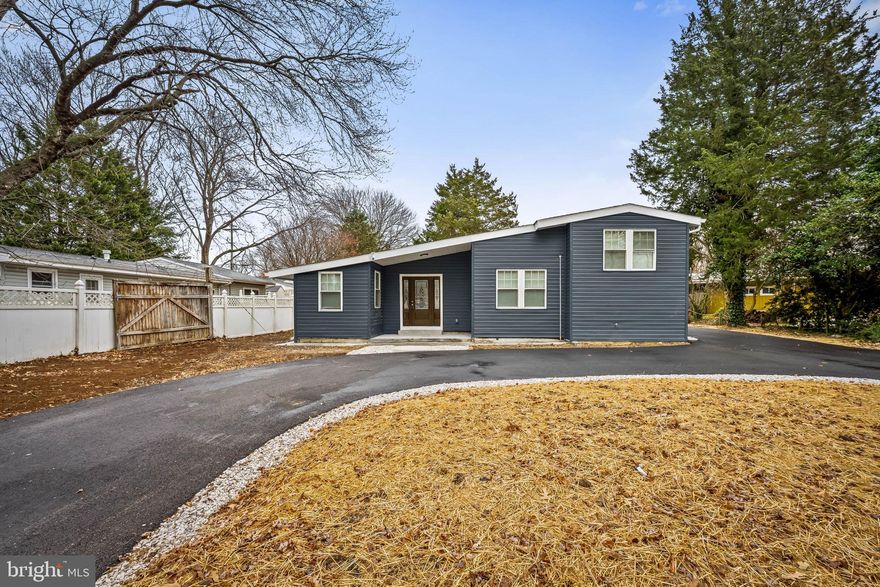 OPEN HOUSE on Saturday 1/17 from 2-4PM! Welcome to this beautifully renovated homethat truly has it all! Nestled on a corner lot, this spacious property has been thoughtfully updated from top to bottom with modern finishes and high-end touches throughout. Step inside to find a stunning, brand-new kitchen featuring sleek granite countertops, stainless steel appliances, and custom cabinetry—perfect for cooking and entertaining. Enjoy brand-new flooring and fresh paint throughout the home, adding a bright and contemporary feel to every room. The main level features a spacious lounge room with built in fireplace, and a bedroom.  A cozy lounge area near the entrance provides a perfect spot to hang your coat and kick off your shoes. Upstairs, you'll find two bedrooms and two bathrooms, including a private primary suite complete with a full bathroom—your own peaceful retreat. The fully finished basement offers even more space with a large living area, an additional bedroom, and direct access to the backyard. With room to roam and entertain both inside and out, this property is a rare gem. Conveniently located, with easy access to Rt 2 & Rt 50, this home is perfectly situated for those commuting to DC or Baltimore.