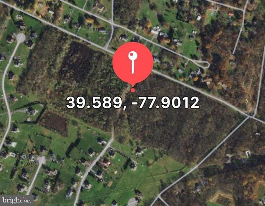 Potential large lot mini community with NO HOA.  Just One hour from Washington DC or Baltimore MD.  Prime 40 acre parcel with 3,200 feet of state highway frontage on two state highways.  Ideal for residential large lots  with public water, septic and NO road construction cost.  Corner location just 1.5 miles form I-81.  10 minutes to Hagerstown or Martinsburg WV.   Public water across frontage.  Electric and high speed cable on site. Just 10 min from Hagerstown MD or Martinsburg WV.  please call for more information.