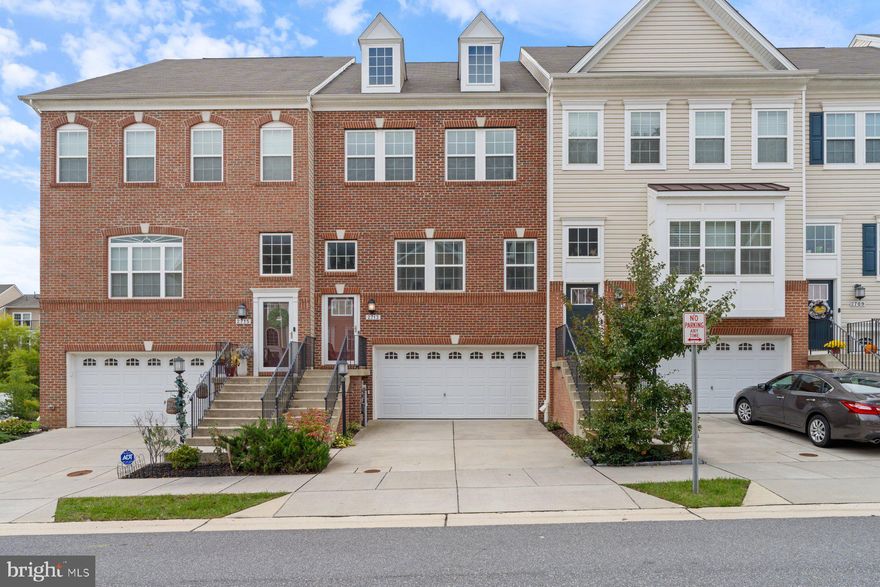 OWN THIS HOME WITH A 4.5% INTEREST RATE- YES, REALLY.  ASK ME HOW!       

This stunning Ellicott model by Lennar is a 3-level brick-front townhome that feels like a vacation every day! With 2,772 finished square feet, this beauty blends modern luxury with comfortable living.

Step inside to discover gleaming wood floors that flow throughout the main and upper levels, creating a seamless, elegant look. The open-concept main level features a gourmet kitchen with a large center island, quartz countertops, stainless steel appliances, wall oven w/ microwave, and a 5-burner gas cooktop — perfect for entertaining or family nights in. The kitchen opens to a bright dining area and spacious family room accented by a ceiling fan and large windows that fill the home with natural light.

Step outside to the showstopper: a gorgeous deck with a pergola that gives pure vacation vibes! Whether you’re sipping coffee in the morning or relaxing at sunset, this outdoor oasis is your new favorite spot.

Upstairs, the wood floors continue through the hallway and the owner's bedroom, creating a cohesive and upscale feel. The owner’s suite is a retreat, offering a sophisticated bath and generous closet space.

The finished lower level provides flexibility for a recreation space, home office, gym, or movie room — complete with an electric fireplace and a walkout access to your private fenced backyard.

Located in Summerfield Village, this home offers community amenities like walking/jogging trails, dog park, playgrounds, and a community center — plus easy access to shopping, dining, and commuter routes.