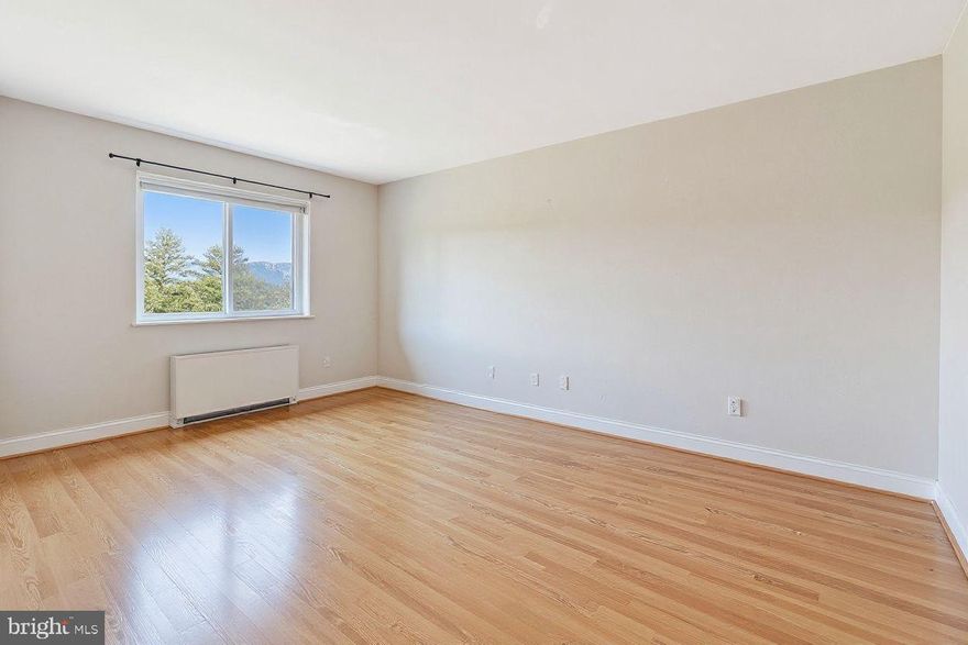 Bright, move-in ready studio just minutes from DC—perfect for first-time homebuyers or anyone tired of renting! This beautiful freshly painted, sun-filled unit at The Fairmont features an open floor plan, upgraded wood flooring throughout entire unit, in-unit washer/dryer combo,  new refrigerator, and a large walk-in closet. Secured-access building with elevator, assigned parking, plus ample guest parking. The condo fee includes water and gas utilities, exterior property maintenance, and—providing convenience, cost predictability, and low-maintenance living. Enjoy convenient amenities including a swimming pool, picnic area, and on-site laundry. Ideally located just a short walk to the DC line, minutes away from Takoma Park, Silver Spring, Fort Totten Metro, University of Maryland, Catholic University, Trinity University, shopping, and much more. Affordable ownership with unbeatable convenience—schedule your tour today!