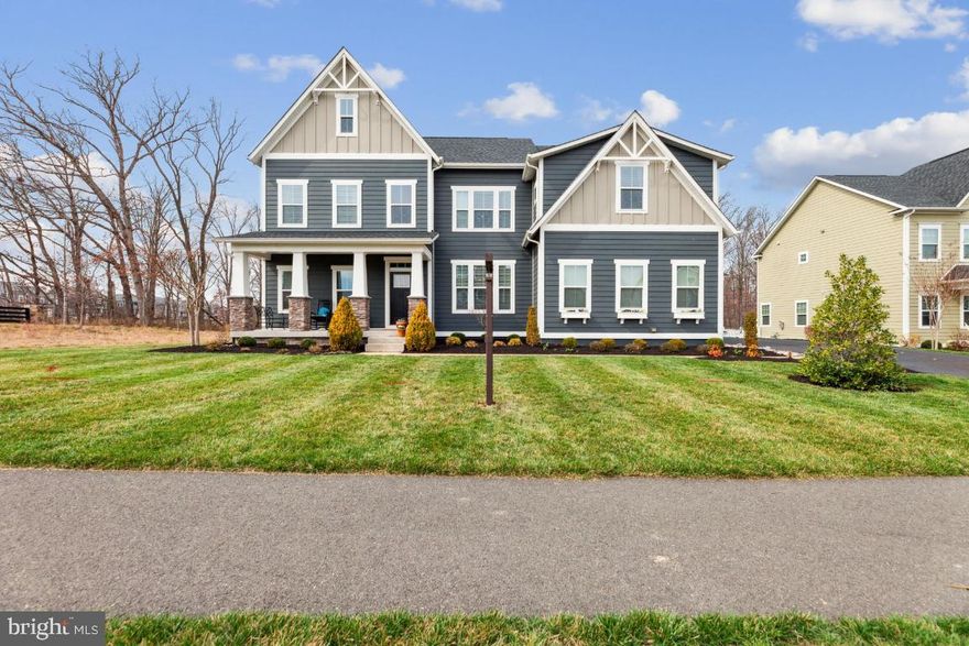 Welcome to luxury living in the sought-after Greens South at Willowsford community! This extraordinary 5-bedroom, 4.5-bathroom Corsica model with loft offers unparalleled elegance and comfort.

Approaching the residence, you're greeted by a charming covered front porch, setting the tone for the exquisite features within. Situated on a private lot backing to trees, with no neighbor on the left side, this home ensures privacy and tranquility.

Step inside to discover a formal dining room perfect for hosting gatherings highlighted by custom shelves made from 200 year old reclaimed wood, while a large main level study adorned with custom barnwood doors crafted from reclaimed 200-year-old wood offers a unique touch of character. The family room boasts a coffered ceiling and a cozy fireplace accented by a custom mantle made from 200 year old reclaimed barnwood, seamlessly flowing into the expansive chef's kitchen. Equipped with a massive island, quartz countertops, stainless steel appliances, soft-close drawers, and a large walk-in pantry, this kitchen is a culinary enthusiast's dream. A mudroom leads to a 2-car garage and separate 1 car garage, adding convenience to daily living.

Engineered hardwood floors adorn the entire main level and upper-level hallway, complementing the home's modern design. Upstairs, the lavish primary suite awaits with tray ceilings, an oversized spa bathroom, and spacious walk-in closets. Three additional bedrooms, including one with an ensuite bath, and a loft perfect for a second family room, offer versatile living spaces. The upper level is complete with a large laundry room for added convenience.

The lower level of this home is a haven for relaxation and entertainment, featuring a fifth bedroom, a spacious full bathroom, expansive recreational space, and a workout room with padded flooring. Outside, the backyard beckons with a deck and two patios. One patio boasts a lighted pergola, outdoor ceiling fan, and a built-in firepit, while the other offers a serene flagstone setting.

Experience resort-style living with access to Willowsford amenities, including a clubhouse, fitness center, lakes, fishing ponds, a splash water park, community pools, and scenic walking trails. Don't miss the opportunity to call this extraordinary property home!

Open Houses scheduled for Saturday March 23rd 12-2pm and Sunday March 24th 11-1pm.