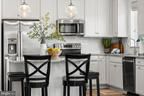 Photo of 13950 Englefield Drive #203, WOODBRIDGE, VA 22193 (MLS # VAPW2117636)