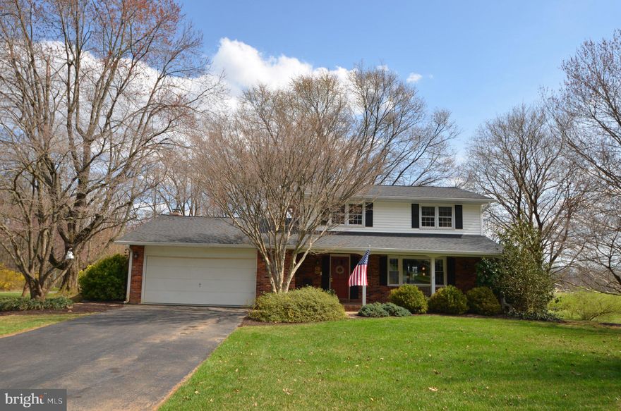 Nestled in the charming South Carroll Estates, this delightful Colonial home offers a perfect blend of comfort and functionality. With its classic brick front exterior and inviting front porch, the property exudes warmth and character. The large flat lot is beautifully landscaped, features mature trees and serene views of the trees and huge open pasture behind. Enjoy all that nature has to offer with lots of wildlife creating a peaceful retreat right in your backyard. Inside, the spacious layout boasts four bedrooms and two and a half bathrooms, providing ample space for relaxation and entertaining. The cozy family room features a charming brick fireplace, walk out to your rear patio and is open to the eat-in kitchen that is perfect for gathering or entertaining. Step outside to enjoy the expansive yard, complete with a gazebo and large shed, ideal for outdoor gatherings or quiet moments in nature. The attached two-car garage and driveway offer convenient parking options. The community is enriched by its proximity to excellent schools, parks, shopping and eating that will ensure a vibrant lifestyle. This home is not just a place to live; it's a place to thrive. Experience the perfect blend of comfort, nature, and community in this inviting residence.