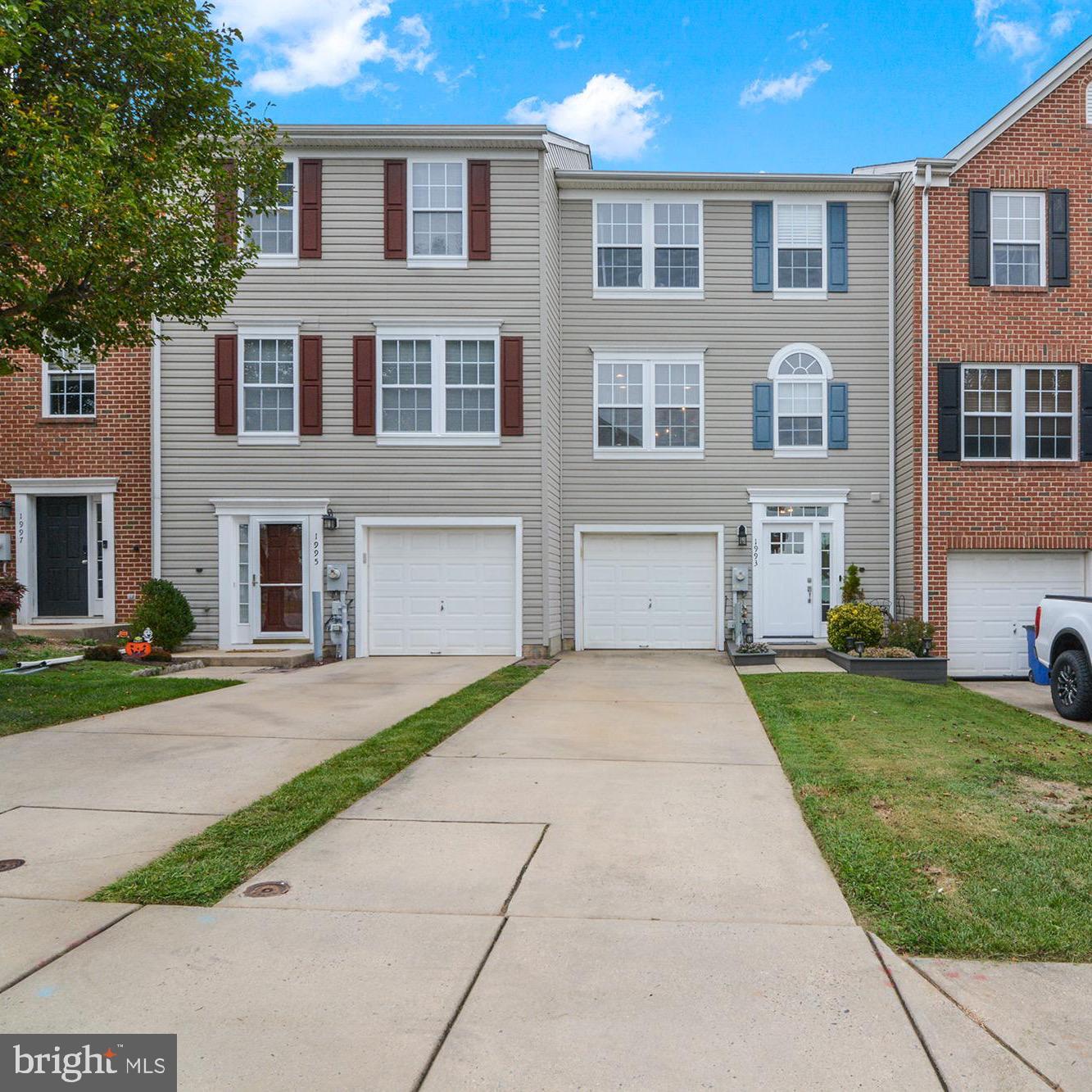Move-in ready, updated three-bedroom townhome in Spenceola Farms II with an open floor plan and neutral decor. Main level features spacious living room with wood flooring and a slider to new deck and great fenced backyard; dining room with convenient pass-through to the kitchen; gorgeous kitchen with stainless appliances, bright white cabinetry, wood flooring, granite counters, and large center island. Upper Level boasts large primary suite with walk in closet and primary bath; two additional sizable bedrooms with ample closet space and another full bath. Finished Lower Level includes fantastic recreation room with LVP flooring, half bath, and walkout to back yard. Additional highlights include off street parking on driveway or in one car garage; Updates include new HVAC; new washer and dryer ; new dishwasher and refrigerator