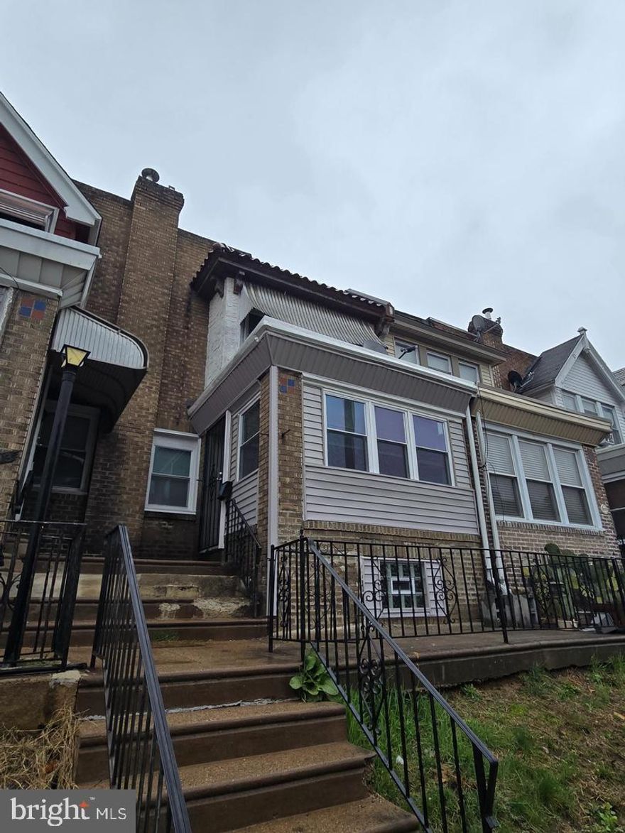 Welcome to this beautiful townhouse, located in the Kingsessing section of Philadelphia. Property features a brand new kitchen with plenty of counter and cabinet space featuring a breakfast bar, new floors throughout, beautiful new spacious bathroom on the 2nd floor, basement is full and unfinished but very clean with painted walls, property is close to transportation and shopping and is located on a beautiful block. Parking in the back of the property. Total monthly payment as low as $1350.00, total cash needed to purchase approximately $2900.00. Call for more details.