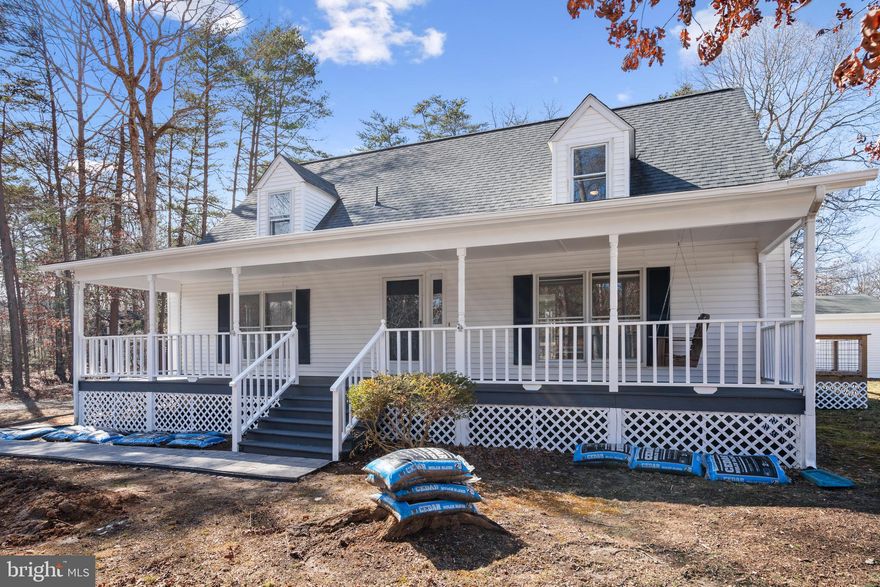 Charming Updated Cape Cod in Lake Anna Woods

This beautifully updated 2-story Cape Cod offers modern living in the serene, gated community of Lake Anna Woods. Sitting on a 1.31-acre corner lot, this 4-bedroom, 2-bath home has been completely renovated—with new floors, new appliances, and upgrades throughout, making it move-in ready!

The owner's suite is a true retreat, boasting a spacious new bathroom and a large closet for ample storage. Enjoy outdoor living on the wrap-around deck or relax on the huge front porch, perfect for taking in the peaceful surroundings. The property also includes a large detached garage, providing ample storage for vehicles, tools, or watercraft.

As a resident of Lake Anna Woods, you’ll have access to Lake Anna, one of Virginia’s largest freshwater lakes, offering boating, fishing, swimming, and hiking—all within a private, gated setting.

With its modern updates, spacious layout, 1.31-acre lot, and prime location near the lake, this home is a rare gem waiting for you to make it your own!