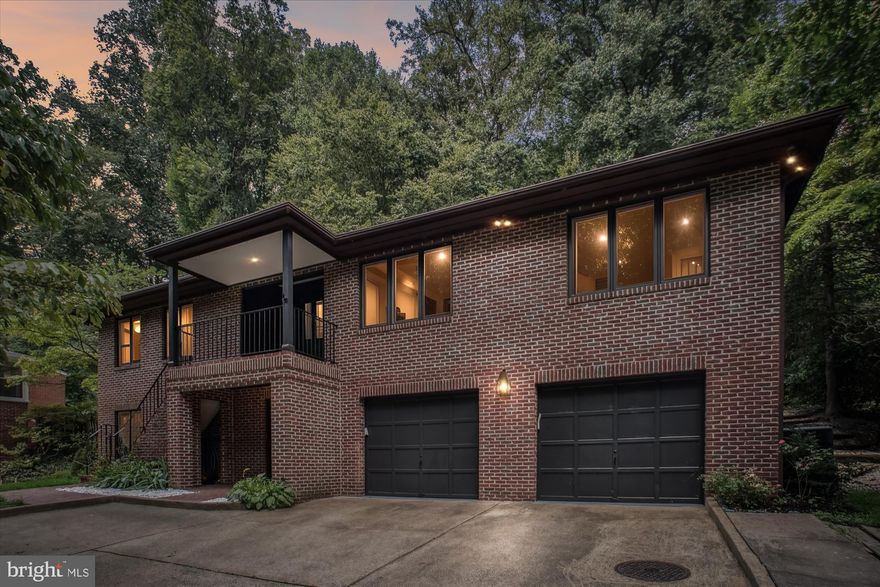 Welcome to this Stunning Contemporary Home in Arlington! 
Nestled in the serene Bellevue Forest neighborhood, this expansive home at 3909 N 30th St offers a harmonious blend of luxury, comfort, and natural beauty. 
Situated on a generous 0.33-acre lot and located in the highly desirable Jamestown-Williamsburg-Yorktown school pyramid district, this home provides both seclusion and proximity to urban amenities. 

Boasting over 3,500 sq. ft. of above-grade living space. 
The main level features 3 spacious bedrooms and 3 full bathrooms. An open floor plan with soaring ceilings, abundant natural light, and hardwood floors creates an inviting atmosphere. 
The expansive dining and living rooms are perfect for entertaining and making lasting memories. 
A highlight of the home is the great room, located off the kitchen, with vaulted ceilings, built-in shelving, and new sliding glass doors that open to a 350-square-foot private patio, overlooking a wooded back and side yards.  
A new elevator connects the levels, ensuring accessibility and convenience throughout the home. 

The lower level offers an additional 800-square-foot private living space, ideal for extended family, guests, or as a ready-to-go rental unit. Access is available from the main level, the garage, or via a separate entrance at the front of the house. This beautiful private suite features a bedroom, living and dining areas, a fully equipped kitchen, and a full bath w/ space and hook up for a full size washer and dryer. 

Updates & Upgrades:
By mid-September 2025 - Brand new elevator installed. June 2025 - New 2nd sliding door in the family room. 
2025 – New main-level washer, water-saving toilets, main-level SS stove, and SS over-range microwave. 
2023 - New sliding door in the family room. 
2022 – New main-level dryer, new main-level SS dishwasher, new hot water heater installed, and garage door openers (app/remote-controlled motor).
2021 – New SS fridges on the main and lower levels, lower-level bathroom remodeled, radon mitigation system installed, and new attic fan installed.
2017 – New 25-year asphalt architectural shingles roof installed.
The oversized attached two-car garage provides plenty of space for a workshop, additional storage, and convenience.
Accommodating closets and storage spaces are found throughout the home.
The property backs to trees and offers direct access to an entrance to the 30.16 acres of the secluded and wooded stream valley of Donaldson Run Park. Enjoy hiking, biking, and dog-friendly trails along Donaldson Run.

Arlington is consistently recognized as one of the best places to live in the U.S., offering a vibrant community with a variety of parks, restaurants, cultural activities, and a diverse array of outdoor pursuits.
This home combines the tranquility of a wooded setting with the convenience of urban living, offering a unique opportunity to experience the best of Arlington.
This home has received plenty of love and is in excellent condition, with fresh paint throughout, new carpets, and more. Come see it as soon as you can. You are welcome to contact the listing agent to schedule a tour or ask any questions.