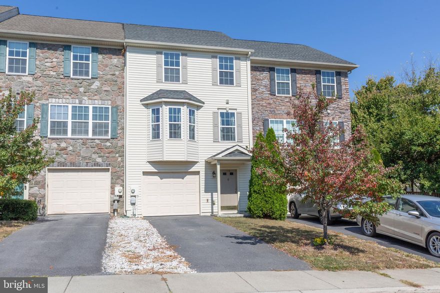 This beautifully maintained three story townhome is conveniently located in the Hammonds Mill Community of Martinsburg, WV!

You are welcomed by the fully finished walk-out basement which includes a large entry foyer, half bath, office/recreation room, access to the fenced rear yard and upper deck, and 1 car garage with storage space.

Enjoy the warmth of the main level’s open floor plan with carpeted living room; half bath; eat-in kitchen with island and access to the rear upper deck, lower patio, and fenced rear yard - perfect for year-round entertaining.

The upper level features a generous primary bedroom suite with walk-in closet, full shower, dual vanity; two additional bedrooms, washer and dryer, and an additional full bath.

Located off of US 11; just minutes from I-81 and ten minutes from the Maryland border.