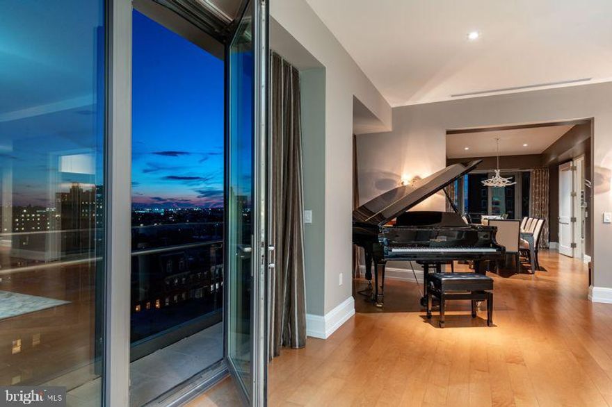 Located in the luxurious and prestigious 1706 Rittenhouse Square Condominium. This very Private Modern building seamlessly blends elegance with privacy. With only 31 exclusive Residences spanning 31 stories high. 1706 offers an intimate, upscale living experience. Residence 801 is a masterpiece, featuring very high ceilings and floor to ceiling windows on four sides and 4,166 square feet. This four-bedroom residence offers breathtaking views from every room. A private, keyed elevator opens directly to your private foyer leading into a grand Living Room with floor-to-ceiling windows and glass doors that open onto a terrace—perfect for enjoying both indoor and outdoor living. A Large Dining Room Seats 12-14 or more for dinner parties and Holidays. The design emphasizes seamless entertaining, with Two Terraces and panoramic views from every angle. Sunlight floods the interior, complemented by 10-foot ceilings and wide plank flooring. 

The gorgeous eat-in kitchen features a spacious casual dining area with stunning city views, custom cabinetry, quartz countertops, high-end appliances, and a large center island—ideal for cooking and entertaining. 

The primary suite is a private retreat, offering a king-size walk-in closet, and an Exquisite Bathroom with a large soaking tub, a separate large glass shower, dual vanities, marble throughout, and luxurious fixtures. Three additional sunlit bedrooms feature generous closets along with stunning views. The fourth bedroom is currently used luxurious home theater and screening room. 

1706 Rittenhouse Square has Amazing Amenities. The Concierge offers a chauffeur-driven car to take you around the city. Swim in the Lap Pool,  Sit in the Sauna, and/or work out in the Gym. There is a Conference Room, Party Space, and a Catering Kitchen. Read a Book or work on your Laptop in the Private, Lushly Landscaped Garden, and 2 Parking Spaces are included.