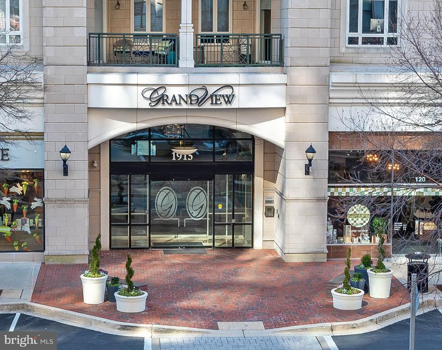 The epitome of luxury living resides in Annapolis at Grand View! Reduced for QUICK SALE and best value in the building with a 10th floor location. Experience the pinnacle of sophistication in this exquisite high-rise condominium. Step into a world of elegance as you enter through the secured entrance, providing you with peace of mind and a sense of exclusivity. With on site friendly staff, you can rest assured, your packages will be delivered and handled and you will be greeted with kindness. The moment you step foot into this stunning residence, you'll be captivated by the sleek and stylish wood floors that adorn the living spaces, adding a touch of warmth and refinement. The high ceilings create an atmosphere of grandeur, while the expansive windows allow an abundance of natural light to flood the rooms, creating an inviting and cheerful ambiance. Prepare to be mesmerized by the breathtaking views that surround you from every angle, providing a constant reminder of the beauty that Annapolis has to offer.  Indulge in the luxurious amenities that this building has to offer. Take a dip in the rooftop pool, providing you with a tranquil oasis to unwind and soak up the sun. Elevate your social gatherings in the exclusive lounge area, perfect for entertaining guests or simply relaxing in style. Maintain your fitness routine in the state-of-the-art fitness center, ensuring that your well-being is always prioritized. For your convenience, secured storage is included on the basement level, allowing you to stow your belongings with ease and peace of mind. Never worry about finding parking again, as covered parking is provided, with 2 assigned spaces, one near the entry, ensuring your vehicle is protected. To top it all off, a private balcony awaits you, offering a serene outdoor space to enjoy your morning coffee as the sun comes up or a glass of spirits as the sun sets. Don't miss out on this incredible opportunity to elevate your lifestyle to new heights. Experience the luxury, comfort, and conveniences that await you in this high-rise condominium, steps to top restaurants, ease of shopping, and entertainment. Make this exceptional residence your new home and immerse yourself in a world of opulence.