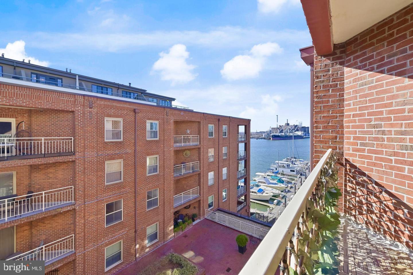 Experience modern city living in the heart of Fells Point with this beautifully maintained 6th-floor condo featuring a private balcony—perfect for relaxing solo or entertaining friends.
This spacious 2-bedroom, 1.5 bath home offers large windows, abundant natural light, and smart storage throughout. The owner’s suite includes a spa-like bath with a soaking tub and separate glass-enclosed shower. Additional highlights include an in-unit laundry room with extra storage, a separate storage unit, and two dedicated parking spaces. Recent upgrades include new luxury vinyl flooring, new washer & dryer, new dishwasher, new sliding glass doors and updated window treatments—offering a fresh, move-in-ready feel throughout the space.
Enjoy resort-style amenities such as a 24/7 front desk, fitness center, and an outdoor pool with a hot tub and lounge area.
Step out your door to the waterfront promenade and enjoy all that Fells Point has to offer—from award-winning restaurants and shops to lively neighborhood events.
Schedule your private showing today and see what waterfront living is all about!