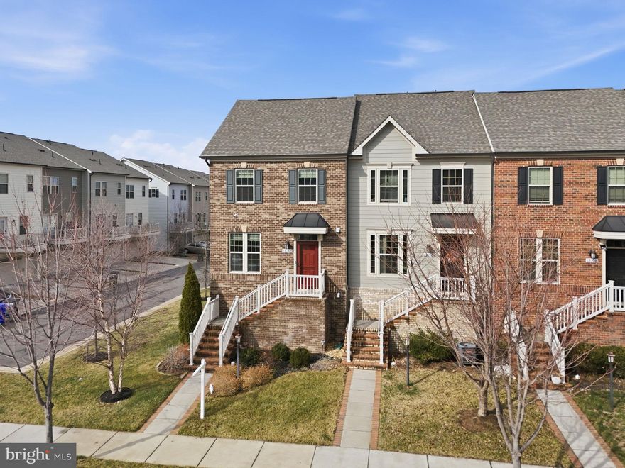 At 18112 Red Cedar Road you’ll find a home that lives easily and beautifully. With over 2,000 square feet, three bedrooms, and 2.5 baths, the layout feels open, welcoming, and thoughtfully designed for the way people actually live, AND for qualified VA buyers, the home is also eligible for a VA LOAN ASSUMPTION at an exceptional 2.25% interest rate, a unique opportunity in today’s market. The main level is where the home really shines. Natural light pours in from multiple directions thanks to the END-UNIT location, creating a warm and relaxed atmosphere throughout the open living space. Engineered hardwood floors, detailed crown molding, and a clean, modern palette make the space feel polished without being formal. The kitchen naturally becomes the heart of the home. Rich espresso cabinetry, stainless steel appliances, gas cooking, and a classic white subway tile backsplash create a timeless look. A large granite island invites conversation, casual meals, or hosting friends, while the built-in hutch with glass cabinets and under-cabinet lighting adds both charm and practical storage. Just off the kitchen, step onto the composite deck — a perfect spot for morning coffee, or grilling dinner. Upstairs, the primary suite offers a peaceful place to unwind. The tray ceiling adds a sense of space, while the custom walk-in closet designed by Closets by Design (with a transferable lifetime warranty) makes organization effortless. The bathroom feels like a private retreat with a soaking tub, separate shower, and dual sink vanity. All three bedrooms are located on the same level and each includes a walk-in closet, plus the convenience of an upper-level laundry area. The lower level offers flexible living space ideal for a home office, gym, or second living area. It could even be transformed into a  legal 4th bedroom. There is also a good-sized storage room with extra large utility sink - great for cleaning up after outside tasks or washing the family fur baby, as well as access to the finished rear-load two-car garage with custom storage cabinets (that convey) and cold AND hot water inside the garage! Additional features include hardwood stairs, custom neutral paint throughout, front storm door, custom blinds (some with remote control),  an alarm system, a 3-zone Rain Bird irrigation system, and a rare side yard that provides extra outdoor space. Living in Potomac Shores means enjoying a lifestyle few communities can match, including 3 pools, The Shores Club fitness center, the Jack Nicklaus Signature Golf Course and Tidewater Grill, the Ali Krieger Sports Complex, and more than nine miles of scenic trails. The $200 monthly HOA includes 1G high-speed internet, fitness center access, community events, trash service, and miles of nature trails. Conveniently located near Marine Corps Base Quantico, I-95, Route 1, Stonebridge Town Center, and Potomac Mills, with the future VRE station and town center already approved and underway.