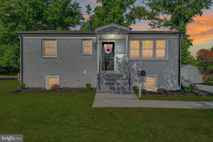 No detail has been overlooked in this EXQUISITE renovation! The main level offers an open floor plan, a gourmet kitchen with quartz countertop waterfall island, white shaker soft close cabinets, stainless steel appliances, modern tile backsplash, designer light fixtures, recess lighting throughout the living area, elegant electric fireplace, separate dining area, new LVT flooring - perfect space for entertaining! Luxurious main level bathroom. Basement with large recreation room, additional two bedrooms, and full bathroom. A ton of natural light! Extended concrete driveway. Shed perfect for extra storage. Extensive upgrades include a new roof (2022), new HVAC (2021), new water heater (2021), new driveway (2022), new outdoor concrete patio (2022), and more. Entertainment and shops nearby include MGM, National Harbor, Tanger Outlets, and Old Town Alexandria. Minutes from 495/210/295/Wilson Bridge, Washington DC, Old Town Alexandria. This home is just waiting for you to move right in: DON’T MISS THIS OPPORTUNITY!