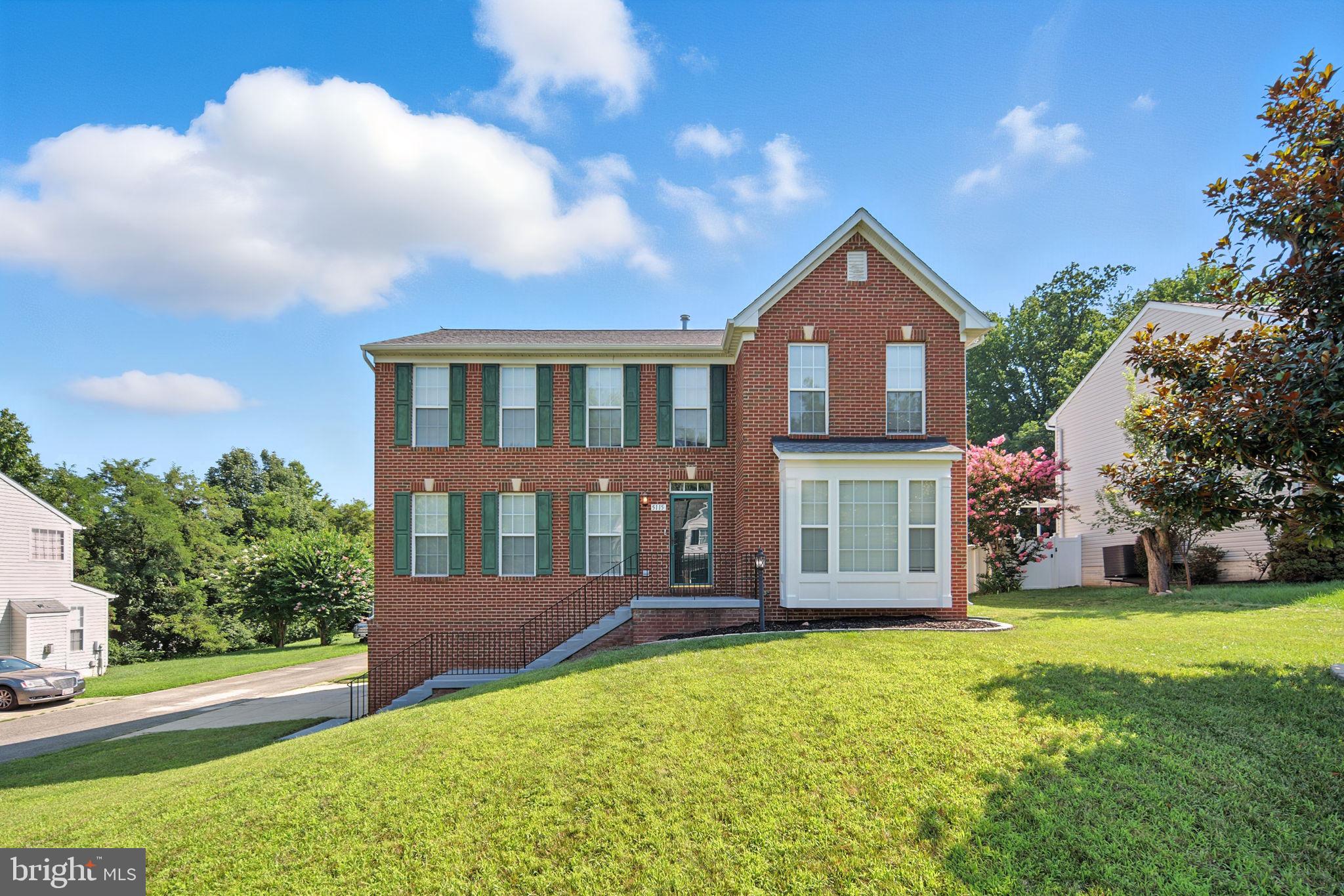 Beautiful and spacious, brick-front, 4-bedroom, 3.5-bathroom home with large fenced-in backyard located just a short commute from Washington DC, the National Harbor, and key military bases (Indian Head Naval Surface Warfare Center, Joint Base Andrews and Joint Base Anacostia-Bolling). This home has just been refreshed with new brushed nickel door hardware, new modern lighting, new upper landing and staircase hardwood to complement the existing main level hardwood floors, new Shaw stain-resistant bedroom carpet, new sink fixtures (half, main and master bath) and new porcelain tile in lower entry, laundry room and 2nd level baths. With a combination of traditional and modern features - this dream home includes formal living and dining rooms off the central main foyer in front of an open floor plan encompassing a large kitchen with breakfast area adjoining a spacious family room with gas fireplace and ceiling fan and providing access to the large backyard deck and fenced back yard. A totally perfect space for entertaining or relaxing. A butler's pantry connects the formal dining room to the kitchen. And the formal living room includes a bay window providing an abundance of natural light. The main foyer also includes a half bath and stairs to the 2nd level. The kitchen features granite countertops, stainless steel appliances, an island with seating, pantry and a desktop work area - plus access to a full laundry room with new LG washer and dryer (coming). Stairs off the family room provide access to the lower-level entry leading to the two-car garage and large recreation room. Upstairs there are four bedrooms and two full baths. The master bedroom includes a walk-in closet, ceiling fan, and en suite bath with soaking tub and separate shower. A truly remarkable home that has it all - close to shopping, dining, parks, and schools, making day-to-day living both comfortable and convenient.