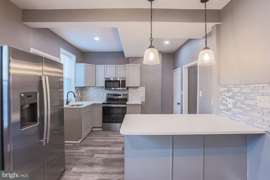 Beautifully Renovated 4 Bedroom, 3.5 Bath Federal-Style Townhome in Baltimore!
Welcome to 3611 Belair Rd — a fully updated home offering modern finishes, spacious living, and thoughtful design from top to bottom. Step inside to a bright and open main level featuring a brand-new kitchen with quartz countertops, high-end stainless-steel appliances, and contemporary cabinetry. The living and dining areas provide plenty of room for everyday comfort and entertaining.
This home offers 4 generously sized bedrooms, 3 full bathrooms, and 1 half bath, along with a fully finished lower level that includes independent rear access—perfect for guests or additional living flexibility.
Enjoy new wood flooring on all three levels, updated HVAC, mostly newer windows and doors, plus upgraded plumbing and wiring. Every detail has been refreshed to provide both style and peace of mind.
A 1-year home warranty is included for added convenience.
Move-in ready and beautifully remodeled—this home is ready for its new owner!