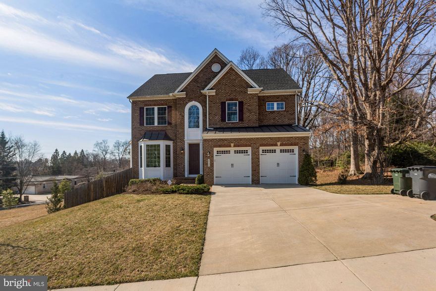 This four level NV Homes Roosevelt model, with loft, is located in the heart of Dunn Loring. Totaling more than 6000 square feet it has seven full size bedrooms and six full bathrooms. Architecturally designed for an open floor plan with an inviting two-story foyer, it brings in tons of natural light. Gleaming oak hardwood floor throughout the main level. Modern gourmet kitchen with a five-burner cooktop. Center island provides ample cooking space and extra storage. Large counter spaces with granite countertop, brand new stainless steel dishwasher and sensored faucet, spacious walk-in pantry, and the convenient butler's pantry adjacent to the gourmet kitchen. Sunny bay windows in the living room, dining room and main level bedroom/study room. Four foot extensions from the standard model add extra living space for the main level family room, upper level master bedroom and lower level recreation room. Carpeted stairs throughout the home provide comfort and safety. A gas fireplace in the family room creates the perfect centerpiece for holiday gatherings. Upper level luxurious owner's suite has a beautiful tray ceiling with crown molding, two walk-in closets on each side of the suite, brand new carpet and an updated ceiling light. Double vanities, a shower with double shower heads and a jacuzzi tub in the master bathroom. All other rooms on the upper level were never lived in. Loft level has the best view overlooking Idylwood Rd. and offers a full bedroom, bathroom, and spacious living room. A perfect space for a childrens play room or for guests. The expansive walkout lower level is more than 1600 square feet in size. The recreation room has a wet bar with a granite countertop, sink, a dishwasher and a beverage refrigerator. The lower level also has one bedroom with a full bathroom and an additional room that can be used as a home gym or an entertainment/media room. The house has a brick exterior with a large garage with enough room for 2 cars, tools and storage. Professionally landscaped yard offers outdoor activities with space for barbecuing. Along the right side of the house are two majestic oak trees. Across Idlywood Road, 1/10th of a mile away is the W&OD Railway Regional Park Trail for walking and bicycling, east to Washington and west to Herndon. Quick and easy access to all major shopping centers (Trader Joe’s and Giant are a 5 minute drive at Route 7) and commuter routes (5 minute drive to Highway 66, 3 more minutes to the Beltway, 495). It is one mile (4 minutes) to the Dunn Loring Metro Station with a bus connector stop at Gallows Rd., 4 minutes to Harris Teeter and restaurants nearby. 2 miles to the trendy Mosaic district with tons of restaurants, shops and movie theater. Close by is Tysons Corner, (7 minutes to Tysons Corner Mall). Both a FULL-sized deck  and the fence will be completed in May.