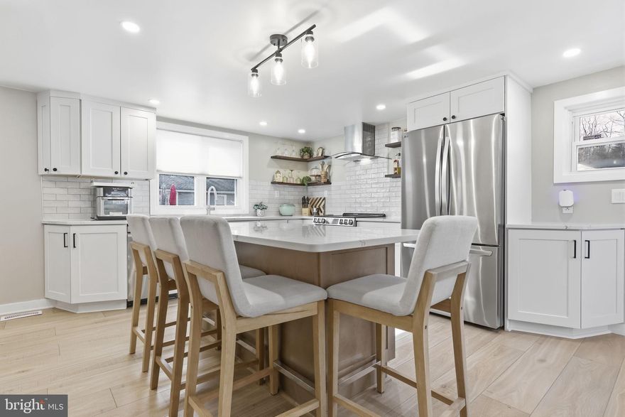 Welcome to a rare opportunity for those who value quality over quantity. Located in the highly sought-after Council Rock School District in Northampton Township and offered at an exceptional price point of $449,900, this fully renovated home delivers something hard to find: a move-in ready property on nearly an acre. Since purchasing in 2024, the current owners have completely remodeled the home from top to bottom, creating a warm, modern, and cohesive living space with no projects left to tackle. From the moment you step inside, you’re welcomed by a bright and inviting interior featuring updated flooring, exposed wood beams, and a stunning stone fireplace that serves as the heart of the home—perfect for cozy nights in. The thoughtfully designed layout flows seamlessly into the fully renovated kitchen, complete with new cabinetry, quartz countertops, and all new appliances—ideal for both everyday living and entertaining. The first-floor bathroom has been beautifully updated with modern finishes, and the washer and dryer have been relocated to the basement to enhance functionality and maximize living space. Upstairs, you’ll find well-sized bedrooms that continue the home’s updated feel, including a comfortable main bedroom equipped with its own mini-split system for added efficiency and comfort. The freshly painted basement offers clean, usable space for storage or future possibilities. Beyond the cosmetic updates, this home offers true peace of mind with major upgrades already completed, including new front and back doors, an updated electrical panel, new water heater, whole-house water filtration system, water softener, and a new garage door and opener. Set on nearly an acre, the property offers a generous outdoor setting with plenty of room to enjoy and personalize—something rarely found at this price point. This makes it a compelling alternative to townhome or condo living, especially for buyers looking for space without the burden of renovations. Whether you’re a first-time buyer, downsizing, or simply looking for a home that’s finished and ready from day one, this property offers a smarter, more intentional way to buy. Why pay for extra rooms you don’t need when you can have land, location, and a home that’s truly move-in ready?