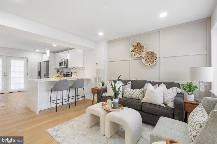 Nestled in the charming Beechfield neighborhood, this exquisite Colonial townhouse offers a perfect blend of modern luxury and timeless elegance. With 896 square feet of thoughtfully designed living space, this home is a sanctuary of comfort and style. Step into the heart of the home, where the gourmet kitchen awaits. Outfitted with high-end stainless steel appliances, including a built-in microwave, gas oven/range, and a sleek dishwasher, this culinary haven is perfect for both everyday meals and entertaining guests. The refrigerator complements the sophisticated aesthetic, ensuring that every detail is both functional and visually appealing. The inviting living areas feature a harmonious mix of plush carpeting and luxury vinyl plank flooring, creating a warm ambiance that beckons you to unwind. Two well-appointed bedrooms and two full bathrooms provide ample space for relaxation and rejuvenation, while the unfinished basement offers endless possibilities for customization. Enjoy the convenience of on-street parking and the vibrant community atmosphere that Beechfield has to offer. This property is not just a home; it's a lifestyle choice that embodies comfort, elegance, and modern living. Experience the joy of coming home to a space that reflects your aspirations and enhances your everyday life.