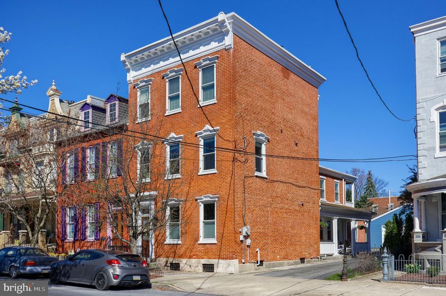 Welcome to the height of luxury living in Lancaster City. This three-story Colonial Revival style brick row house, constructed in 1900, is a rare treasure that emanates elegance and sophistication. Every aspect has been meticulously designed to provide the ultimate in comfort and style, from the striking brick facade to the soaring ceilings. This property has been thoughtfully renovated to conserve its historic allure while offering a unique amalgamation of modern amenities and classic architecture.

Beyond the splendid interiors what truly sets this home apart is its unbeatable location in the vibrant neighborhood of Lancaster. You'll find yourself situated in the heart of the city with easy access to local shopping, exceptional dining, and cultural attractions. Lancaster is one of the oldest inland cities in the United States and is known for its agricultural roots and large Amish community. The strong sense of community in the area makes it an ideal place for recreational opportunities. You can immerse yourself in the cultural landmarks of this historic city and experience its unique charm.

The area's strong sense of community makes it an ideal place for recreational opportunities. The external features of this property include a porch and patio that provide outdoor spaces with picturesque views, perfect for enjoying a morning coffee or entertaining guests with cocktails. A charming side porch and fenced yard offer a haven for relaxation and tranquility. With an oversized 2-car garage and adequate off-street parking, you will never have to worry about finding space for your vehicles or accommodating guests.

This is not just any row home but a piece of history! Overflowing with charm and character, you will be captivated by the meticulously designed interiors. Old English-stained glass accents The open floor plan seamlessly links the kitchen, dining room, and veranda, creating an ideal space for entertaining guests or spending quality time with family. Enter the inviting interior that features stunning hardwood flooring throughout. The abundance of natural light that illuminates the living areas creates a warm and welcoming atmosphere, making it the perfect place to unwind after a long day. Custom w

The chef's kitchen is a standout feature of this home; it is a culinary playground equipped with top-of-the-line appliances and ample counter space. Whether you are hosting a dinner party or simply enjoying a quiet breakfast, this kitchen will inspire the inner chef in you. The side and front entryway, along with two staircases, enhance the convenience and functionality of this home.

Upstairs, you will discover three spacious bedrooms, including a family room with a private balcony and a laundry room. The airy bedrooms offer a serene sanctuary, while the luxurious bathrooms provide a touch of indulgence with their modern fixtures and finishes. The main bedroom with a private alcove is a peaceful retreat, boasting an ensuite bathroom that offers a serene oasis after a long day. Two additional bedrooms provide ample space for guests or a growing family.

In addition to its captivating qualities, this home features a Tesla Solar Roof that not only reduces your carbon footprint but also saves you money on energy bills. Other modern conveniences, such as central air conditioning and a Nest Smart Wi-Fi thermostat, add to this property's unique characteristics and appeal. 

This three-story charmer won’t last long so call and schedule your showing today.