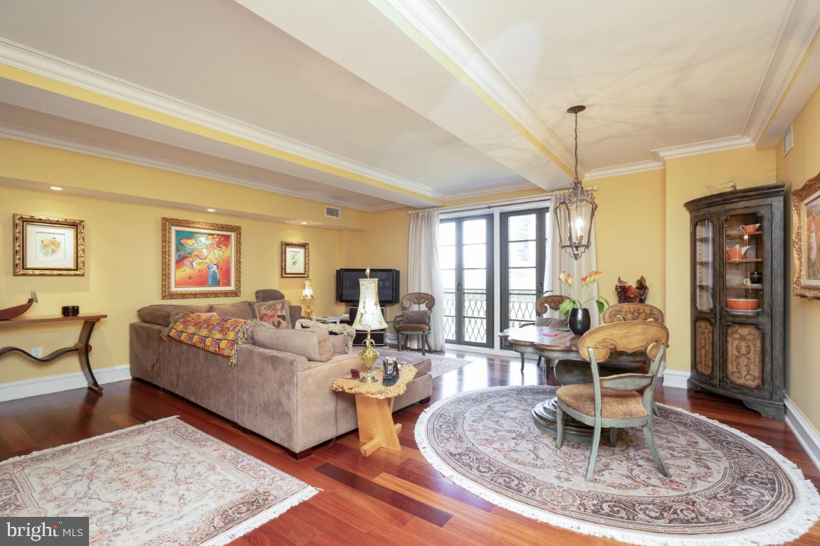 Spectacular 3 bedroom plus home office, 3 bathroom residence with one parking spot included on Rittenhouse Square! Crafted of the finest quality, Unit 807 at the highly coveted Parc Rittenhouse is a sun-soaked three bedroom condominium. The residence offers many tasteful features including treetop views of Rittenhouse Square, spacious bedroom suites, rich hardwood floors and crown and baseboard moldings throughout. Enter through a foyer into the open-concept great room offering separate living and dining areas, beautiful ceilings and a Juliet balcony. There is an open kitchen with wood cabinetry, stainless steel appliances and great counter space thanks to a large island. The lavish primary suite enjoys custom painted trim, walk-in closet, marble-appointed bath with dual vanity and stall shower, and ample space for a home office or sitting area. Bedrooms 2 & 3 have excellent closet space and their own marble-appointed baths; the third bedroom has potential to be utilized as a den. There is a laundry room with a stackable washer/dryer in the unit. You don't want to miss this magnificent home! Residents of Parc Rittenhouse enjoy a 24-hour doorman, state-of-the-art fitness center, clubroom and boardroom and a rooftop club featuring an outdoor pool, whirlpool spa, kiddy pool and sundeck with lounge chairs. Rittenhouse Square is ranked the 6th best neighborhood in North America by Places Rated Almanac. There are 175 restaurants and 199 retailers within a three block radius. Within close walking distance to the Market Street office corridor, The Avenue of the Arts and University City. 30th Street Station and Philadelphia International Airport are only minutes away.