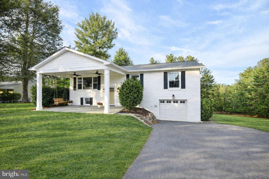 Tucked away at the end of a private cul-de-sac, 4406 Old Farm Road offers a rare combination of privacy, charm, and direct access to nature, backing directly to state parkland in the heart of Baldwin. This lovingly maintained home has been thoughtfully updated with warm, farmhouse-inspired touches throughout. 

A welcoming front porch patio sets the tone, featuring bluestone flooring, a porch swing, and ceiling fans—an ideal spot to relax and enjoy the peaceful surroundings. Inside, the home is light-filled and inviting with newly refinished hardwood floors and fresh paint throughout, creating a clean and cohesive feel across every living space. The updated kitchen showcases painted white cabinetry, quartz countertops, and a crisp subway tile backsplash, offering both timeless style and modern functionality. The home features four bedrooms and three full bathrooms, including two newly renovated baths, providing flexibility and comfort for daily living and guests. Outdoor living is a true highlight, with a rear bluestone patio and expansive deck overlooking the private backyard and the wooded state park beyond—perfect for entertaining, quiet mornings, or evenings surrounded by nature. Recent major updates include a new architectural shingle roof (2021) and a brand new water heater (2026), adding peace of mind for the next owner. 

With its serene cul-de-sac setting, thoughtful updates, and cozy yet refined character, this home offers a special opportunity to enjoy privacy and natural beauty while remaining convenient to everything Baltimore County has to offer.