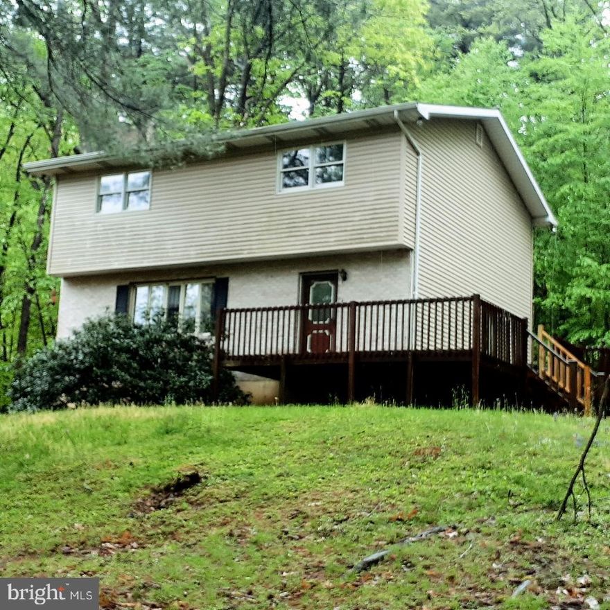 Come take a look at this traditional style home on 1.6 acres right outside of the New Phila Borough.
This home has 4 bedrooms and 1.5 bathrooms. The living room boasts a large brick propane gas fireplace with raised hearth. The kitchen  has oak cabinetry and center island also with cabinets. The dining area has hardwood floors. There is a mini-split system located in the dining room to keep the downstairs cool during hot summers.  Radon mitigation system in place.  There is a half bath just off the kitchen. There are 4 bedrooms on the 2nd floor with an updated bathroom.  The basement is unfinished .  Large deck  to enjoy sitting out on .  This won't last long - Call now to see it for yourself !